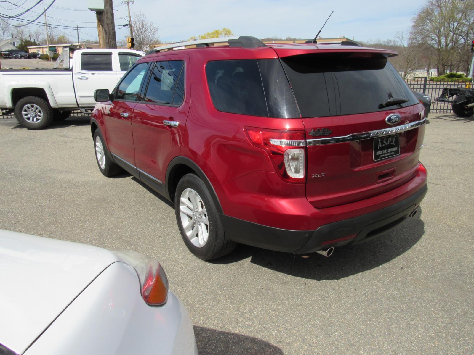 2013 Burgandy /Black Ford Explorer XLT 4WD (1FM5K8D81DG) with an 3.5L V6 DOHC 24V engine, 6-Speed Automatic transmission, located at 215 Milton St, Dedham, MA, 02026, (781) 329-5144, 42.241905, -71.157295 - This nice SUV has room for the hole family. 7 Passenger leather interior. Runs like new. All ASPI Motor Cars vehicles are fully serviced and certified. Comes with a 3/3 nationwide warranty included in the price. Call for details. - Photo #4
