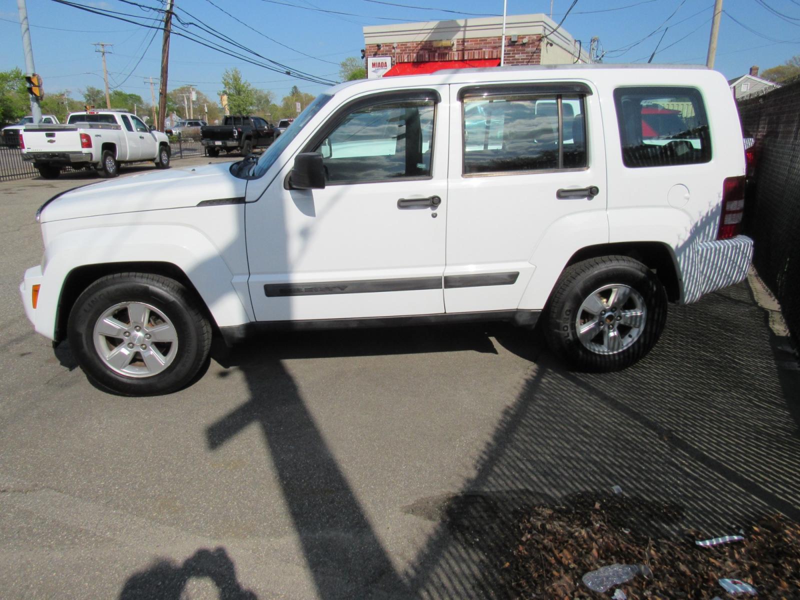 2011 White /Gray Jeep Liberty Sport 4WD (1J4PN2GK6BW) with an 3.7L V6 SOHC 12V engine, 4-Speed Automatic transmission, located at 215 Milton St, Dedham, MA, 02026, (781) 329-5144, 42.241905, -71.157295 - This nice SUV is in excellent condition. This is a Certified vehicle. Comes with a 3/3 nationwide warranty included in the price. Call for details. All ASPI Motor Cars vehicles are serviced before they are delivered to assure the highest quality used vehicles. - Photo #3