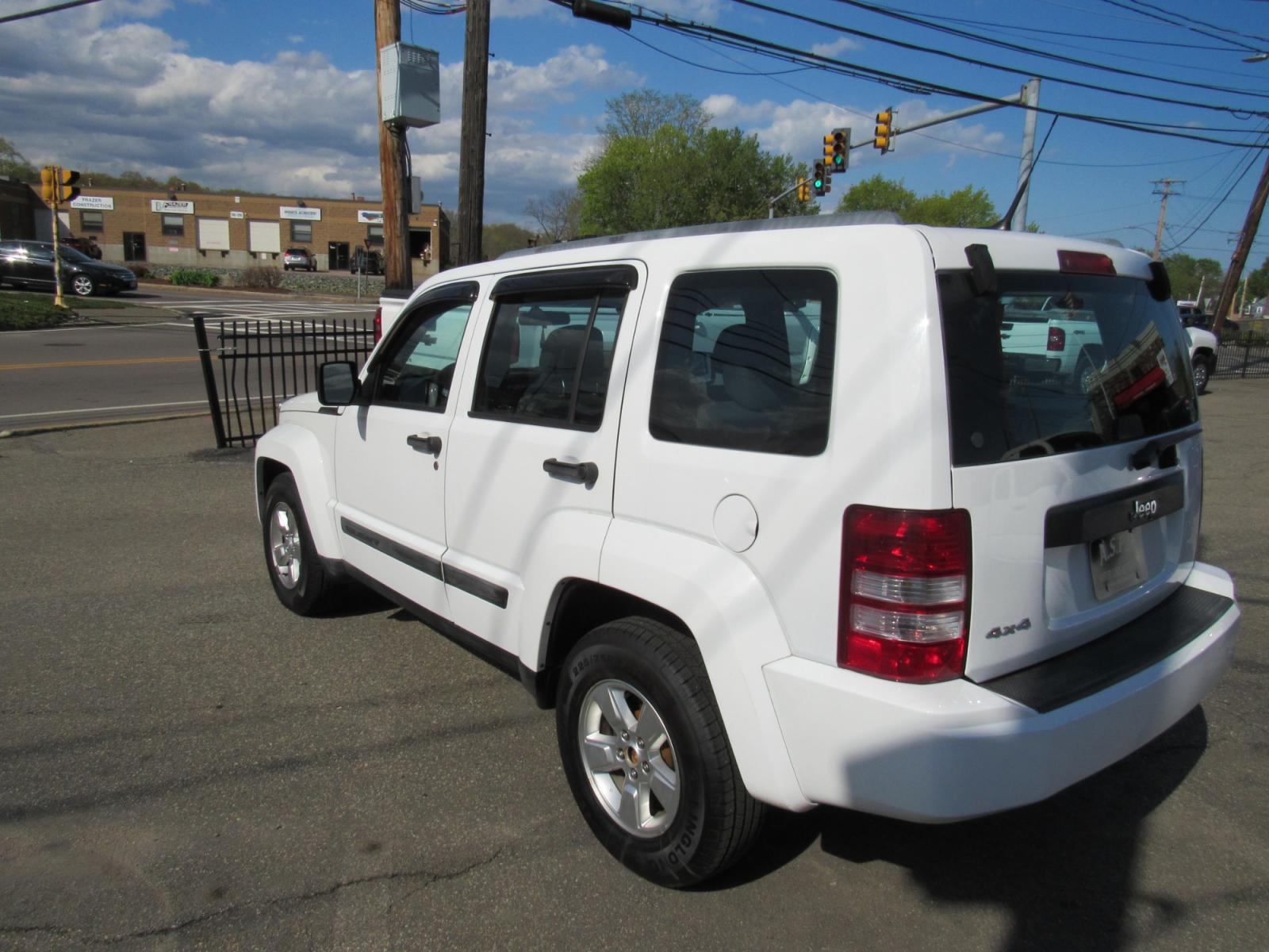 2011 White /Gray Jeep Liberty Sport 4WD (1J4PN2GK6BW) with an 3.7L V6 SOHC 12V engine, 4-Speed Automatic transmission, located at 215 Milton St, Dedham, MA, 02026, (781) 329-5144, 42.241905, -71.157295 - This nice SUV is in excellent condition. This is a Certified vehicle. Comes with a 3/3 nationwide warranty included in the price. Call for details. All ASPI Motor Cars vehicles are serviced before they are delivered to assure the highest quality used vehicles. - Photo #4