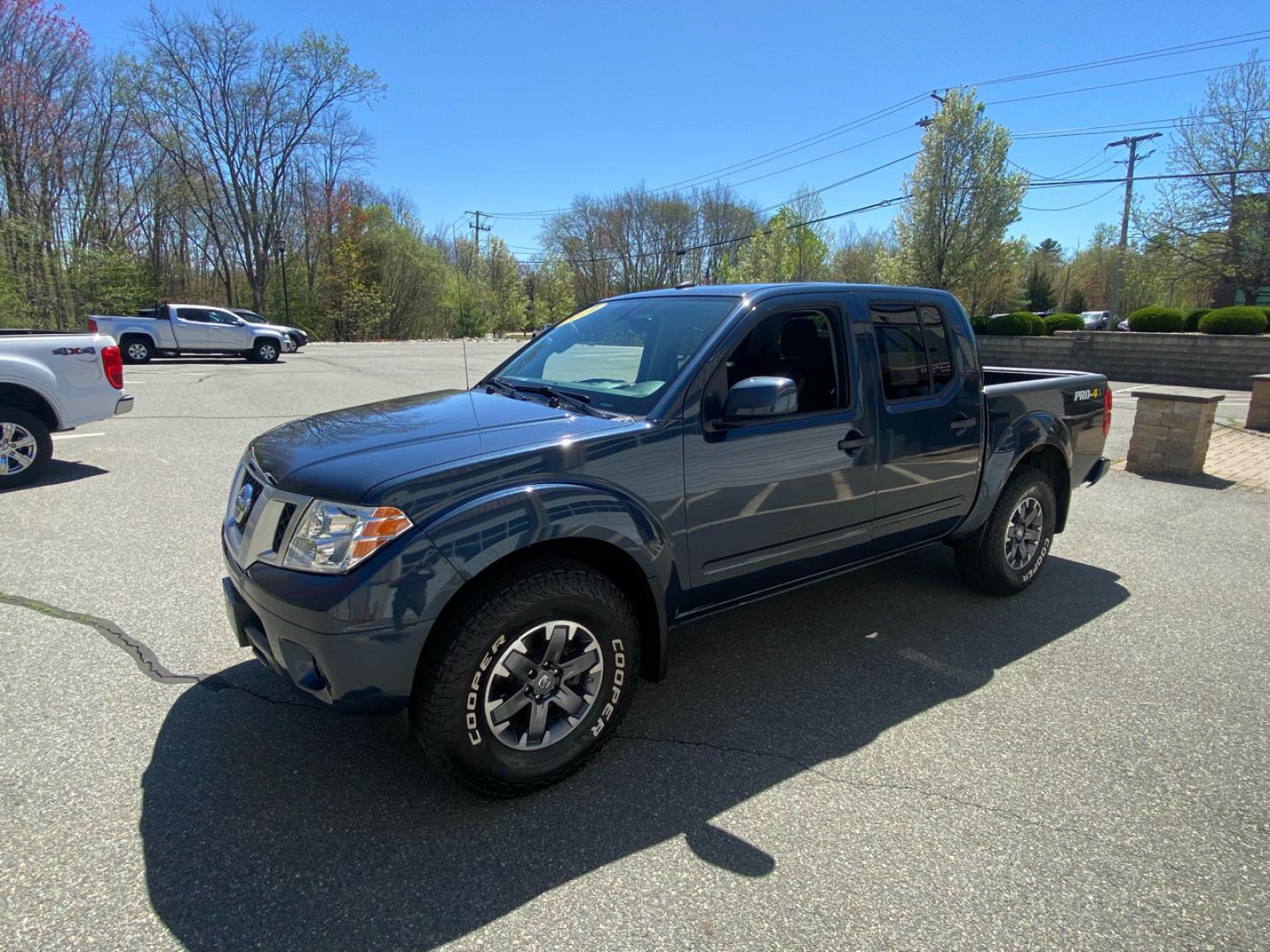 2019 Blue /Grey Nissan Frontier SL Crew Cab 5AT 4WD Pro-4 (1N6AD0EV1KN) with an 4.0L V6 DOHC 24V engine, 5A transmission, located at 215 Milton St, Dedham, MA, 02026, (781) 329-5144, 42.241905, -71.157295 - Single Owner, Low Mileage 4WD. Sure to please on every level!! Prices on all vehicles do not include $299.95 Documentation fee, as well as Massachusetts sales tax, Registration, Title Fee and State inspection. We try our hardest to be as accurate in our descriptions as possible. ASPI Motor Ca - Photo#3