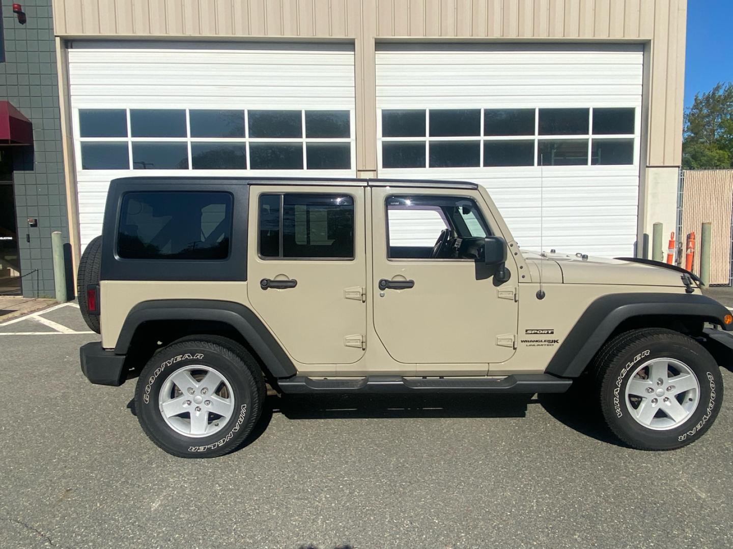 2018 Sahara Tan /charcoal Jeep Wrangler Unlimited Sport 4WD (1C4BJWDGXJL) with an 3.6L V6 DOHC 24V FFV engine, Automatic transmission, located at 215 Milton St, Dedham, MA, 02026, (781) 329-5144, 42.241905, -71.157295 - Super Clean Low milage Jeep Unlimited. Always Serviced, Always Safisfied!!! Trades Welcome - Photo#1