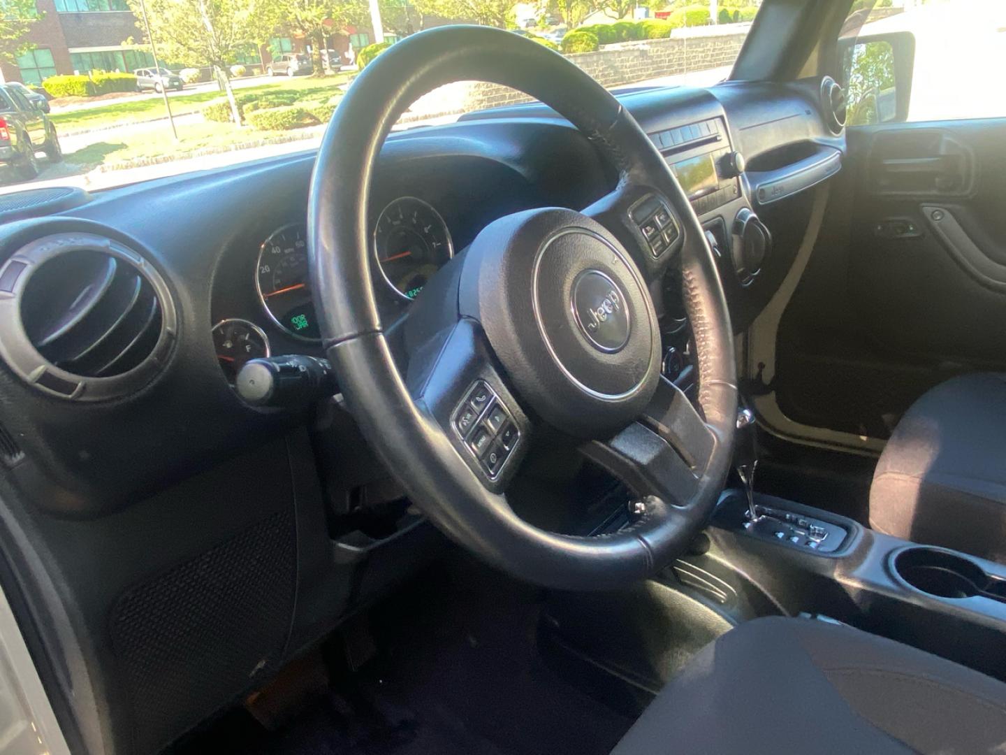 2018 Sahara Tan /charcoal Jeep Wrangler Unlimited Sport 4WD (1C4BJWDGXJL) with an 3.6L V6 DOHC 24V FFV engine, Automatic transmission, located at 215 Milton St, Dedham, MA, 02026, (781) 329-5144, 42.241905, -71.157295 - Super Clean Low milage Jeep Unlimited. Always Serviced, Always Safisfied!!! Trades Welcome - Photo#9