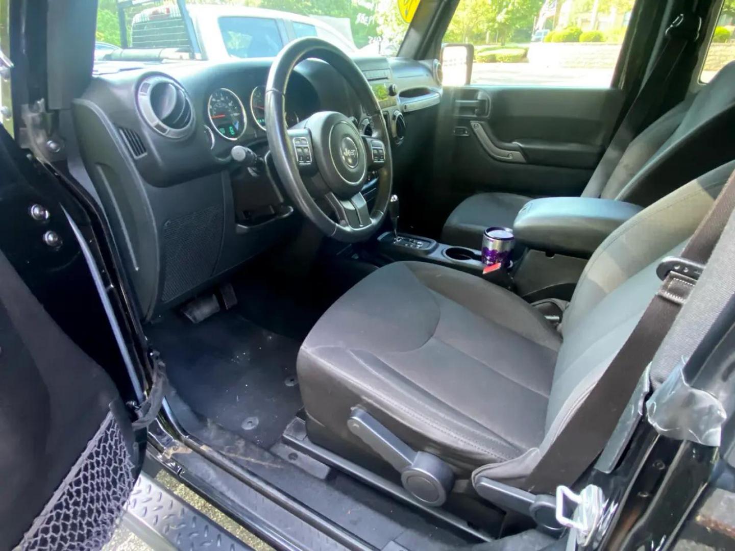 2016 BLACK /Grey Jeep Wrangler Sport 4WD (1C4AJWAG1GL) with an 3.6L V6 DOHC 24V FFV engine, Automatic transmission, located at 215 Milton St, Dedham, MA, 02026, (781) 329-5144, 42.241905, -71.157295 - Nice clean two door Sure to please Prices on all vehicles do not include $299.95 Documentation fee, as well as Massachusetts sales tax, Registration, Title Fee and State inspection. We try our hardest to be as accurate in our descriptions as possible. ASPI Motor Cars is not responsible for err - Photo#7