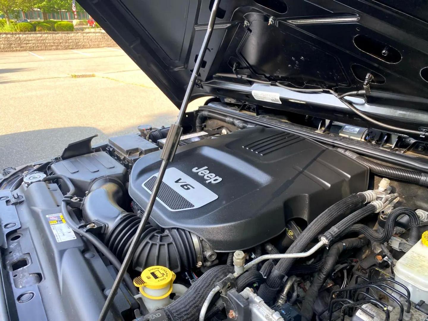 2016 BLACK /Grey Jeep Wrangler Sport 4WD (1C4AJWAG1GL) with an 3.6L V6 DOHC 24V FFV engine, Automatic transmission, located at 215 Milton St, Dedham, MA, 02026, (781) 329-5144, 42.241905, -71.157295 - Nice clean two door Sure to please Prices on all vehicles do not include $299.95 Documentation fee, as well as Massachusetts sales tax, Registration, Title Fee and State inspection. We try our hardest to be as accurate in our descriptions as possible. ASPI Motor Cars is not responsible for err - Photo#18