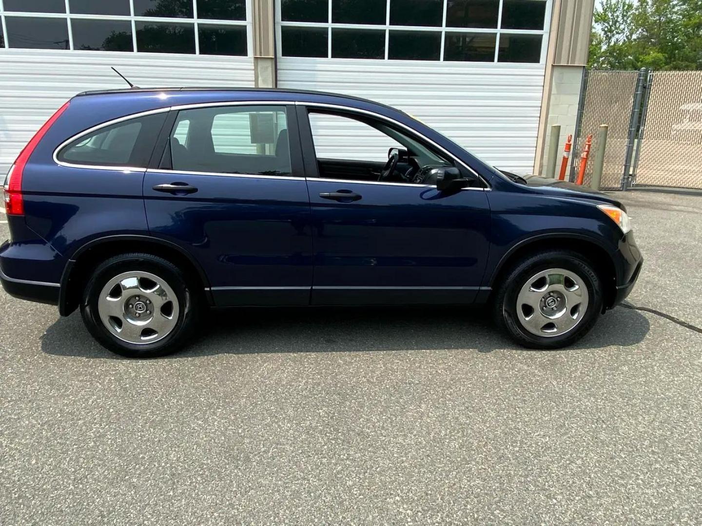 2009 Blue /Grey Honda CR-V LX 4WD 5-Speed AT (JHLRE48379C) with an 2.4L L4 DOHC 16V engine, 5-Speed Automatic transmission, located at 215 Milton St, Dedham, MA, 02026, (781) 329-5144, 42.241905, -71.157295 - Super Clean CRV Drives well. Looks great Always Honda Quality Always Fully warrantied Prices on all vehicles do not include $299.95 Documentation fee, as well as Massachusetts sales tax, Registration, Title Fee and State inspection. We try our hardest to be as accurate in our descriptions as - Photo#1