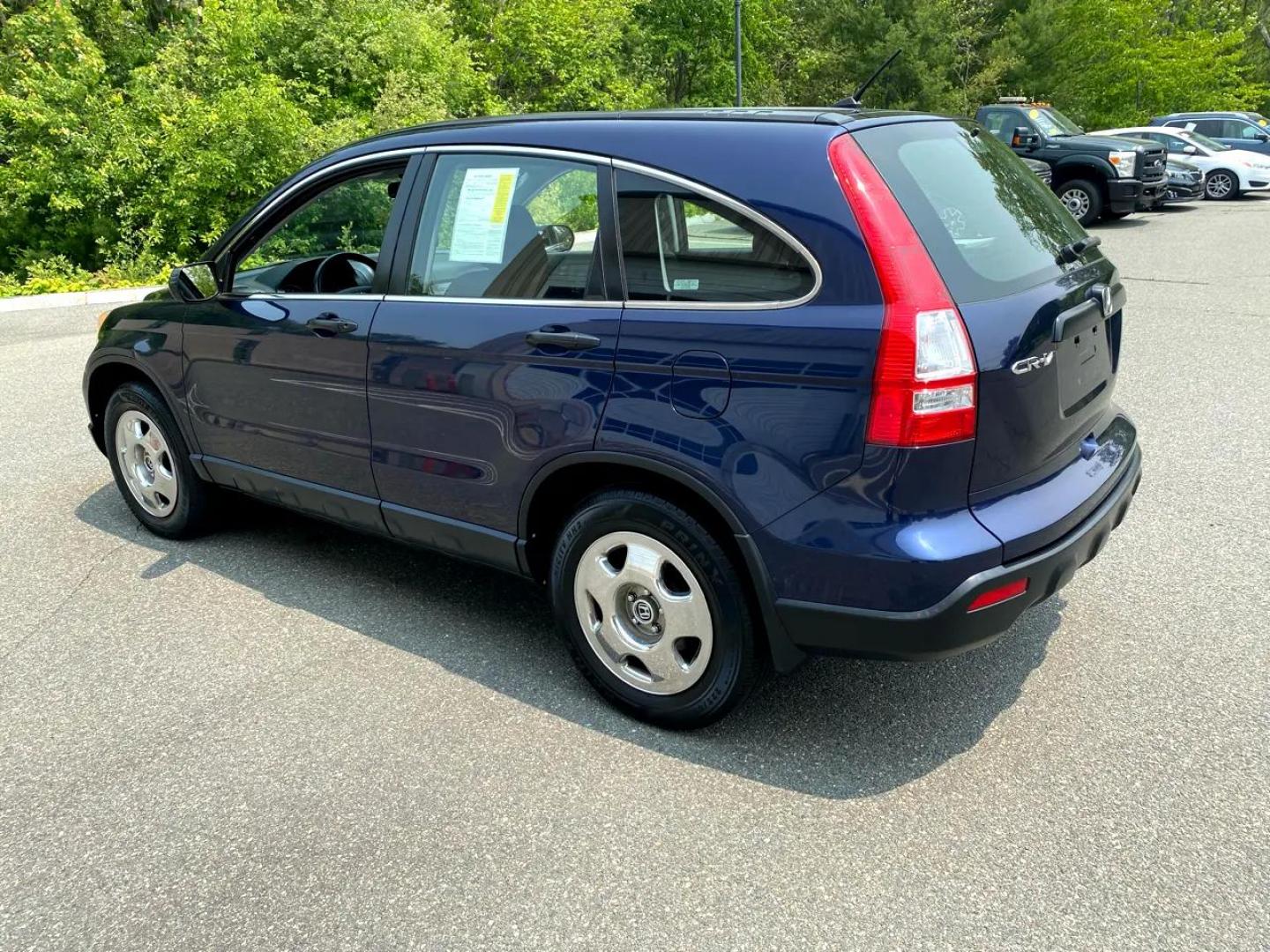 2009 Blue /Grey Honda CR-V LX 4WD 5-Speed AT (JHLRE48379C) with an 2.4L L4 DOHC 16V engine, 5-Speed Automatic transmission, located at 215 Milton St, Dedham, MA, 02026, (781) 329-5144, 42.241905, -71.157295 - Super Clean CRV Drives well. Looks great Always Honda Quality Always Fully warrantied Prices on all vehicles do not include $299.95 Documentation fee, as well as Massachusetts sales tax, Registration, Title Fee and State inspection. We try our hardest to be as accurate in our descriptions as - Photo#5
