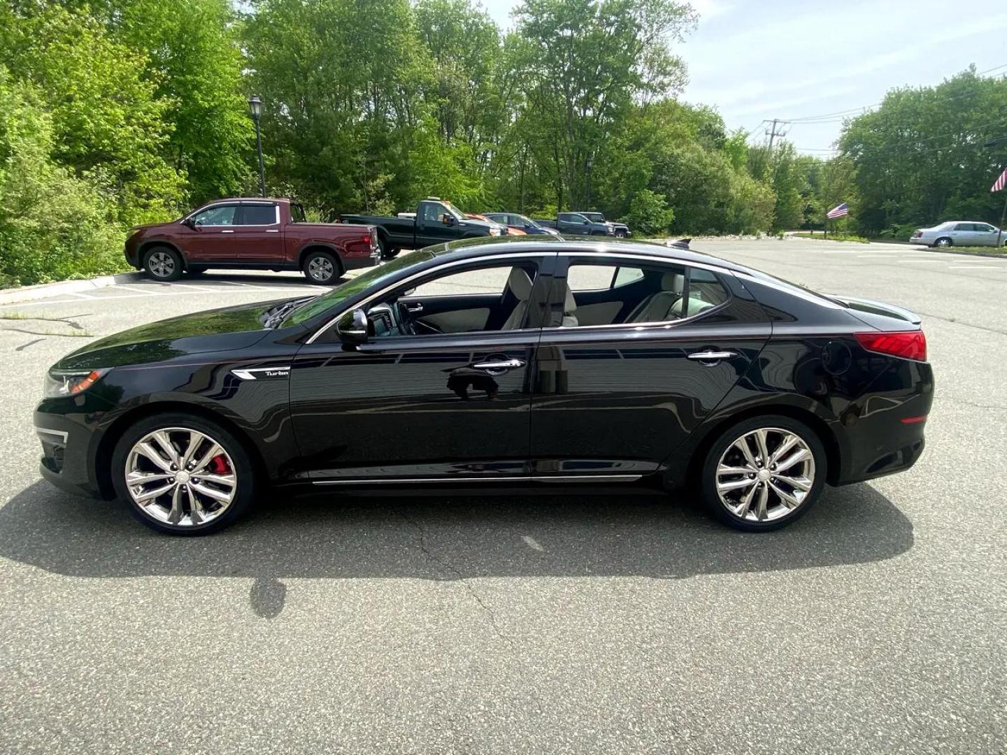 2015 BLACK /White Kia Optima SX Turbo (5XXGR4A67FG) with an 2.0L L4 DOHC 16V TURBO engine, 6-Speed Automatic transmission, located at 215 Milton St, Dedham, MA, 02026, (781) 329-5144, 42.241905, -71.157295 - Just a beauty Prices on all vehicles do not include $299.95 Documentation fee, as well as Massachusetts sales tax, Registration, Title Fee and State inspection. We try our hardest to be as accurate in our descriptions as possible. ASPI Motor Cars is not responsible for errors in listings by 3rd - Photo#3
