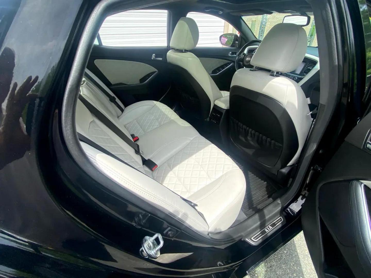 2015 BLACK /White Kia Optima SX Turbo (5XXGR4A67FG) with an 2.0L L4 DOHC 16V TURBO engine, 6-Speed Automatic transmission, located at 215 Milton St, Dedham, MA, 02026, (781) 329-5144, 42.241905, -71.157295 - Just a beauty Prices on all vehicles do not include $299.95 Documentation fee, as well as Massachusetts sales tax, Registration, Title Fee and State inspection. We try our hardest to be as accurate in our descriptions as possible. ASPI Motor Cars is not responsible for errors in listings by 3rd - Photo#16