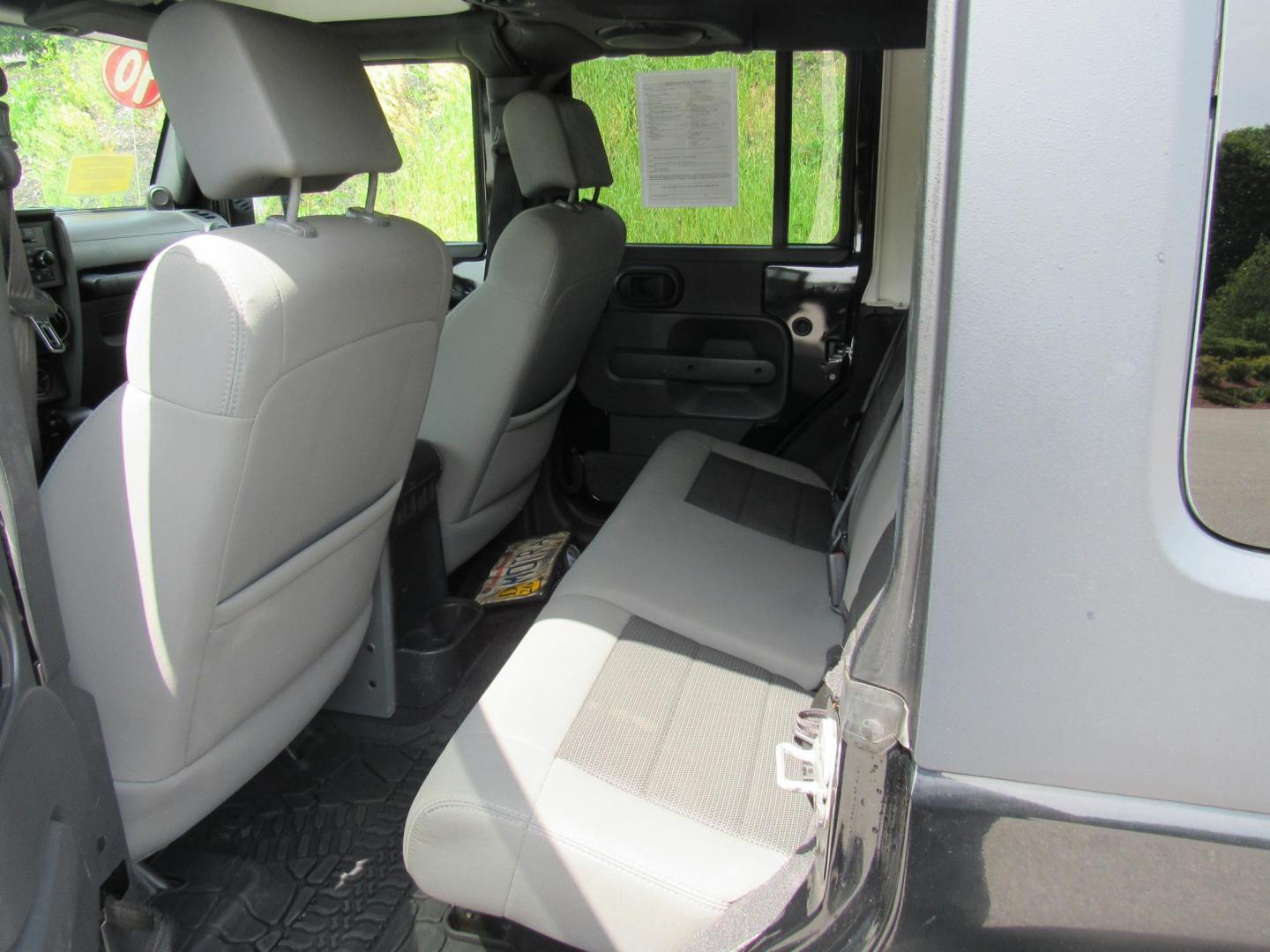2010 BLACK /Gray Jeep Wrangler Unlimited Sport 4WD (1J4BA3H1XAL) with an 3.8L V6 OHV 12V engine, Automatic transmission, located at 215 Milton St, Dedham, MA, 02026, (781) 329-5144, 42.241905, -71.157295 - Photo#14