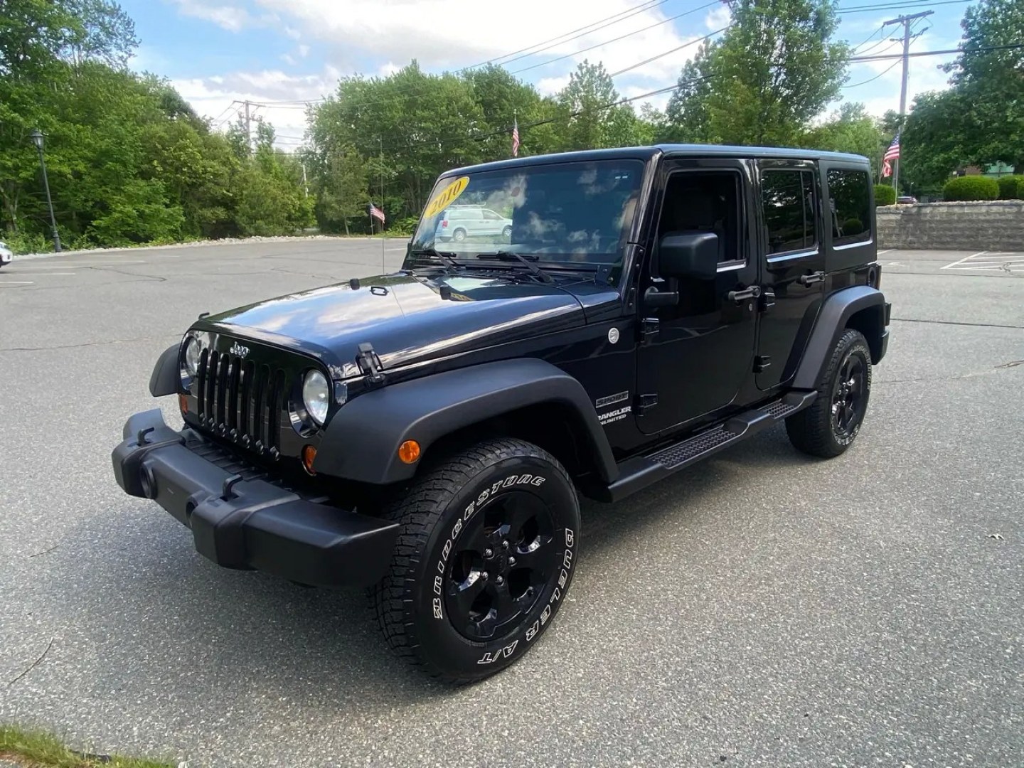 2010 BLACK /Gray Jeep Wrangler Unlimited Sport 4WD (1J4BA3H1XAL) with an 3.8L V6 OHV 12V engine, Automatic transmission, located at 215 Milton St, Dedham, MA, 02026, (781) 329-5144, 42.241905, -71.157295 - Meet a Black 2010 Jeep Wrangler that’s always ready to turn an ordinary commute into a mini adventure. With its classic SUV stance, removable top, and rugged attitude, this Wrangler is built for drivers who like their weekends spontaneous and their roads optional. Under the hood, the gasoline 3.8L- Photo#3