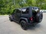 2010 BLACK /Gray Jeep Wrangler Unlimited Sport 4WD (1J4BA3H1XAL) with an 3.8L V6 OHV 12V engine, Automatic transmission, located at 215 Milton St, Dedham, MA, 02026, (781) 329-5144, 42.241905, -71.157295 - Meet a Black 2010 Jeep Wrangler that’s always ready to turn an ordinary commute into a mini adventure. With its classic SUV stance, removable top, and rugged attitude, this Wrangler is built for drivers who like their weekends spontaneous and their roads optional. Under the hood, the gasoline 3.8L- Photo#5