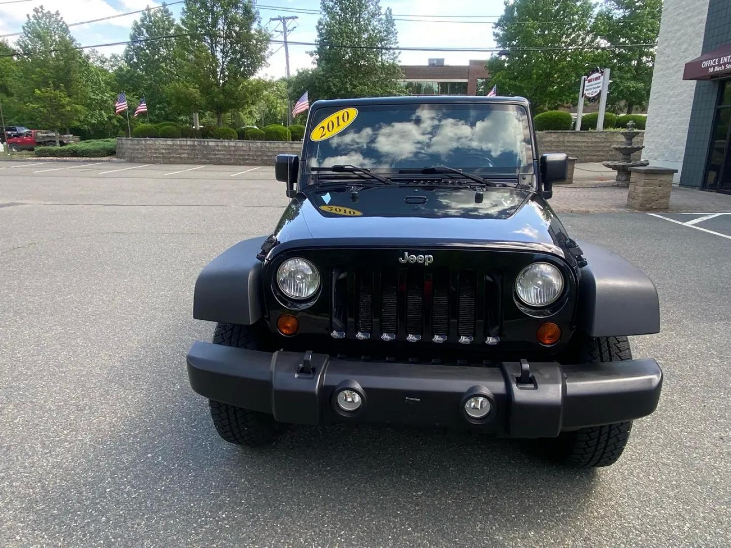 2010 BLACK /Gray Jeep Wrangler Unlimited Sport 4WD (1J4BA3H1XAL) with an 3.8L V6 OHV 12V engine, Automatic transmission, located at 215 Milton St, Dedham, MA, 02026, (781) 329-5144, 42.241905, -71.157295 - Meet a Black 2010 Jeep Wrangler that’s always ready to turn an ordinary commute into a mini adventure. With its classic SUV stance, removable top, and rugged attitude, this Wrangler is built for drivers who like their weekends spontaneous and their roads optional. Under the hood, the gasoline 3.8L- Photo#6