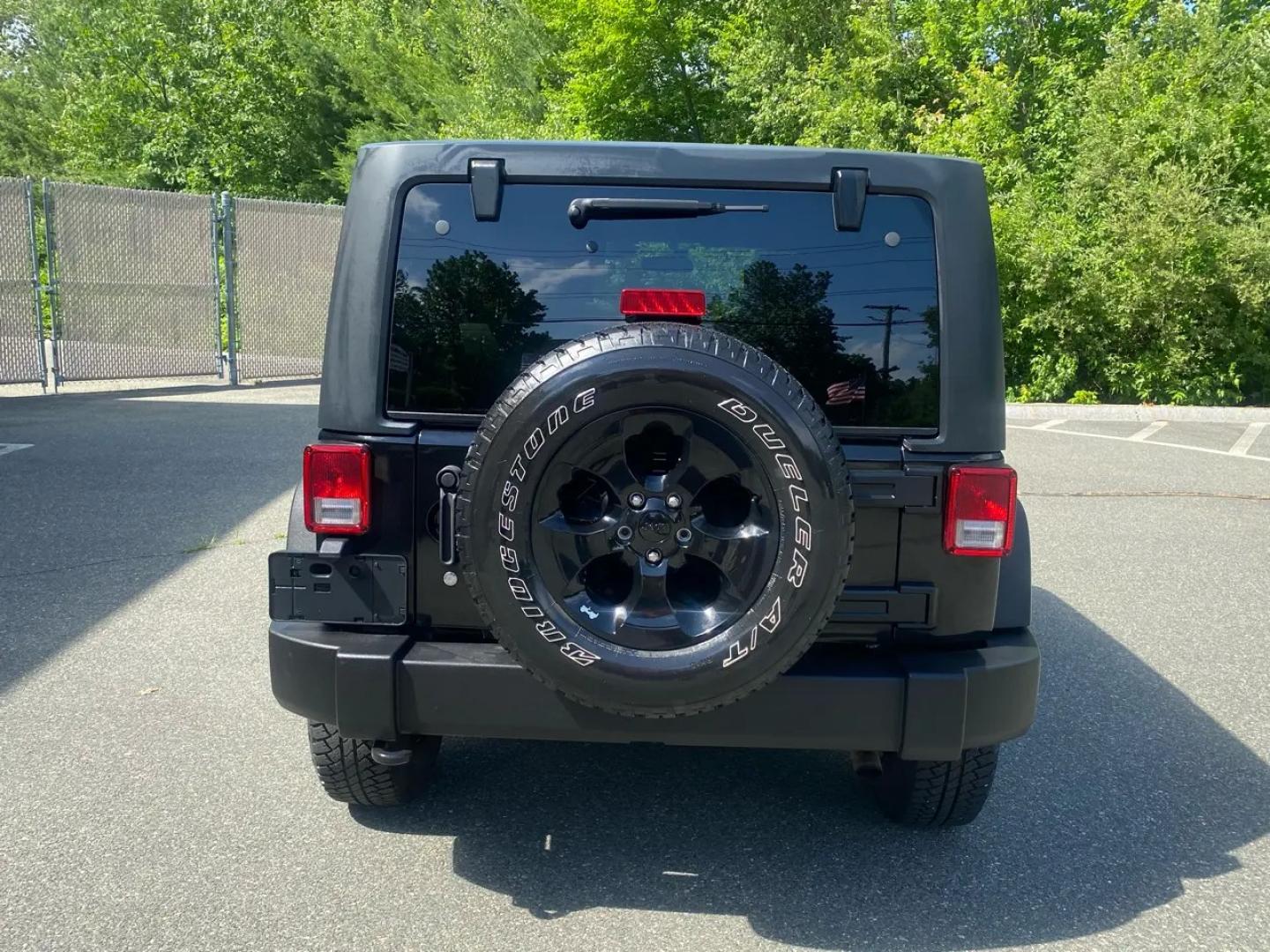 2010 BLACK /Gray Jeep Wrangler Unlimited Sport 4WD (1J4BA3H1XAL) with an 3.8L V6 OHV 12V engine, Automatic transmission, located at 215 Milton St, Dedham, MA, 02026, (781) 329-5144, 42.241905, -71.157295 - Meet a Black 2010 Jeep Wrangler that’s always ready to turn an ordinary commute into a mini adventure. With its classic SUV stance, removable top, and rugged attitude, this Wrangler is built for drivers who like their weekends spontaneous and their roads optional. Under the hood, the gasoline 3.8L- Photo#7