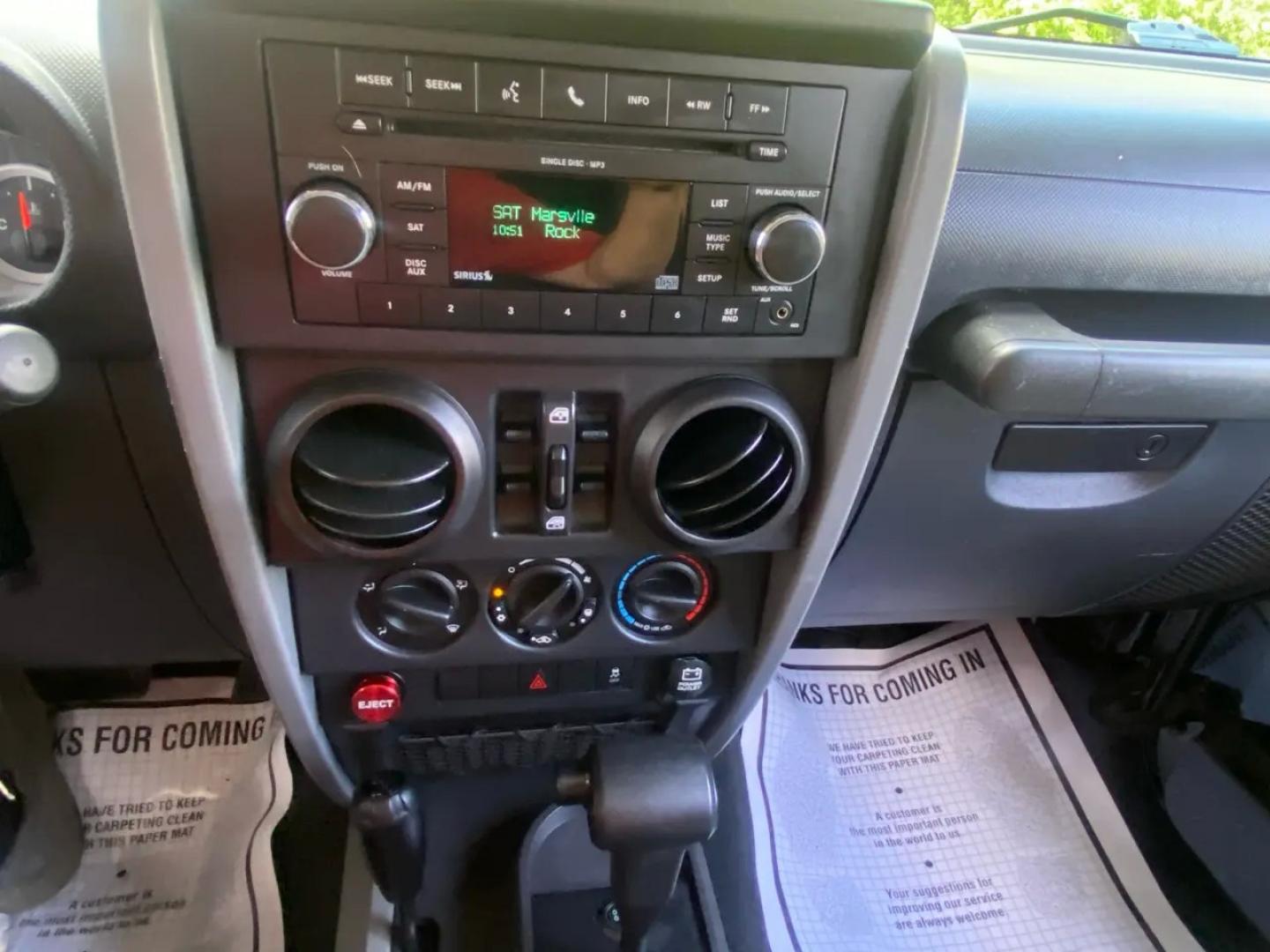 2010 BLACK /Gray Jeep Wrangler Unlimited Sport 4WD (1J4BA3H1XAL) with an 3.8L V6 OHV 12V engine, Automatic transmission, located at 215 Milton St, Dedham, MA, 02026, (781) 329-5144, 42.241905, -71.157295 - Meet a Black 2010 Jeep Wrangler that’s always ready to turn an ordinary commute into a mini adventure. With its classic SUV stance, removable top, and rugged attitude, this Wrangler is built for drivers who like their weekends spontaneous and their roads optional. Under the hood, the gasoline 3.8L- Photo#10