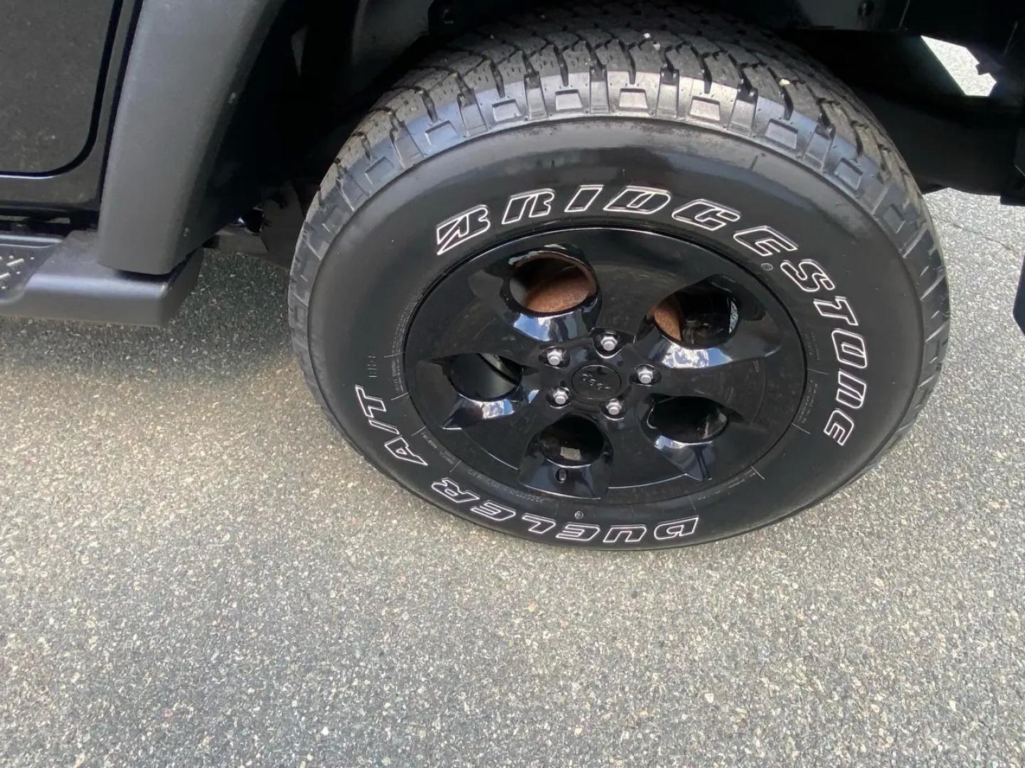 2010 BLACK /Gray Jeep Wrangler Unlimited Sport 4WD (1J4BA3H1XAL) with an 3.8L V6 OHV 12V engine, Automatic transmission, located at 215 Milton St, Dedham, MA, 02026, (781) 329-5144, 42.241905, -71.157295 - Meet a Black 2010 Jeep Wrangler that’s always ready to turn an ordinary commute into a mini adventure. With its classic SUV stance, removable top, and rugged attitude, this Wrangler is built for drivers who like their weekends spontaneous and their roads optional. Under the hood, the gasoline 3.8L- Photo#18