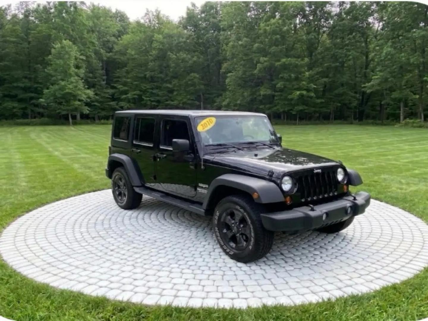 2010 BLACK /Gray Jeep Wrangler Unlimited Sport 4WD (1J4BA3H1XAL) with an 3.8L V6 OHV 12V engine, Automatic transmission, located at 215 Milton St, Dedham, MA, 02026, (781) 329-5144, 42.241905, -71.157295 - Meet a Black 2010 Jeep Wrangler that’s always ready to turn an ordinary commute into a mini adventure. With its classic SUV stance, removable top, and rugged attitude, this Wrangler is built for drivers who like their weekends spontaneous and their roads optional. Under the hood, the gasoline 3.8L- Photo#0