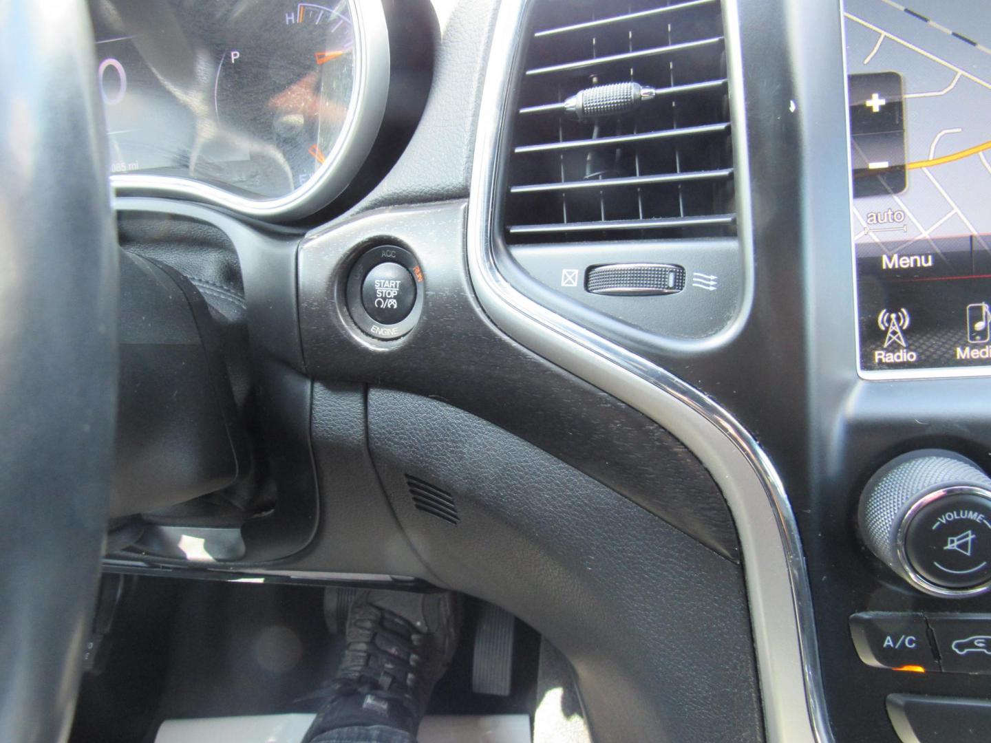 2015 Gray /Black Jeep Grand Cherokee Laredo 4WD (1C4RJFAG8FC) with an 3.6L V6 DOHC 24V engine, 8-Speed Automatic transmission, located at 215 Milton St, Dedham, MA, 02026, (781) 329-5144, 42.241905, -71.157295 - This special edition Altitude is in excellent condition. Runs like brand new. Lots of recent service. Loaded up with Leather, Alloys, Moonroof, Sport suspension. All ASPI Motor Cars vehicles are fully service before they are delivered. Comes with a 3/3 warranty included in the price. Call for detail - Photo#22