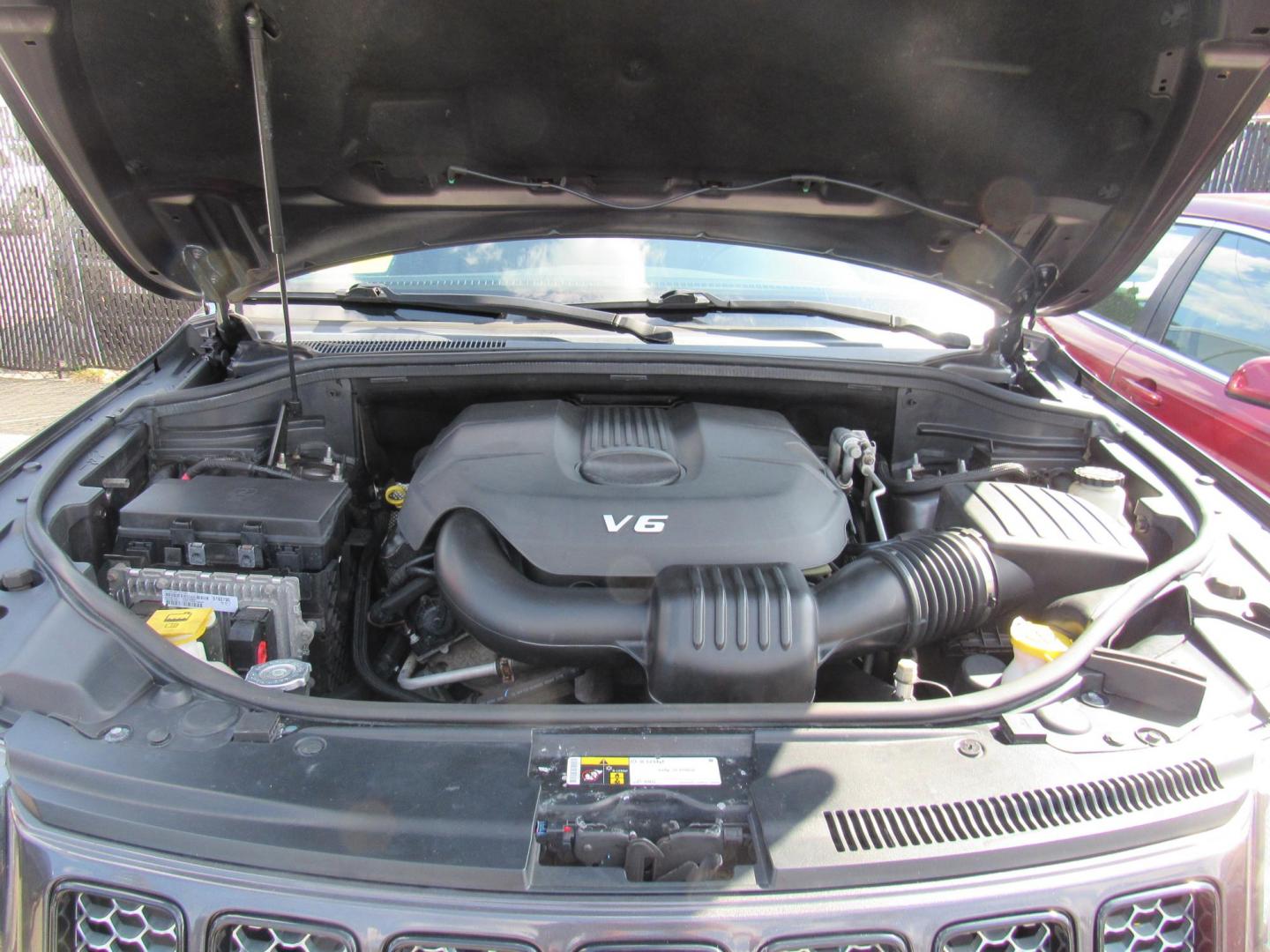 2015 Gray /Black Jeep Grand Cherokee Laredo 4WD (1C4RJFAG8FC) with an 3.6L V6 DOHC 24V engine, 8-Speed Automatic transmission, located at 215 Milton St, Dedham, MA, 02026, (781) 329-5144, 42.241905, -71.157295 - This special edition Altitude is in excellent condition. Runs like brand new. Lots of recent service. Loaded up with Leather, Alloys, Moonroof, Sport suspension. All ASPI Motor Cars vehicles are fully service before they are delivered. Comes with a 3/3 warranty included in the price. Call for detail - Photo#25