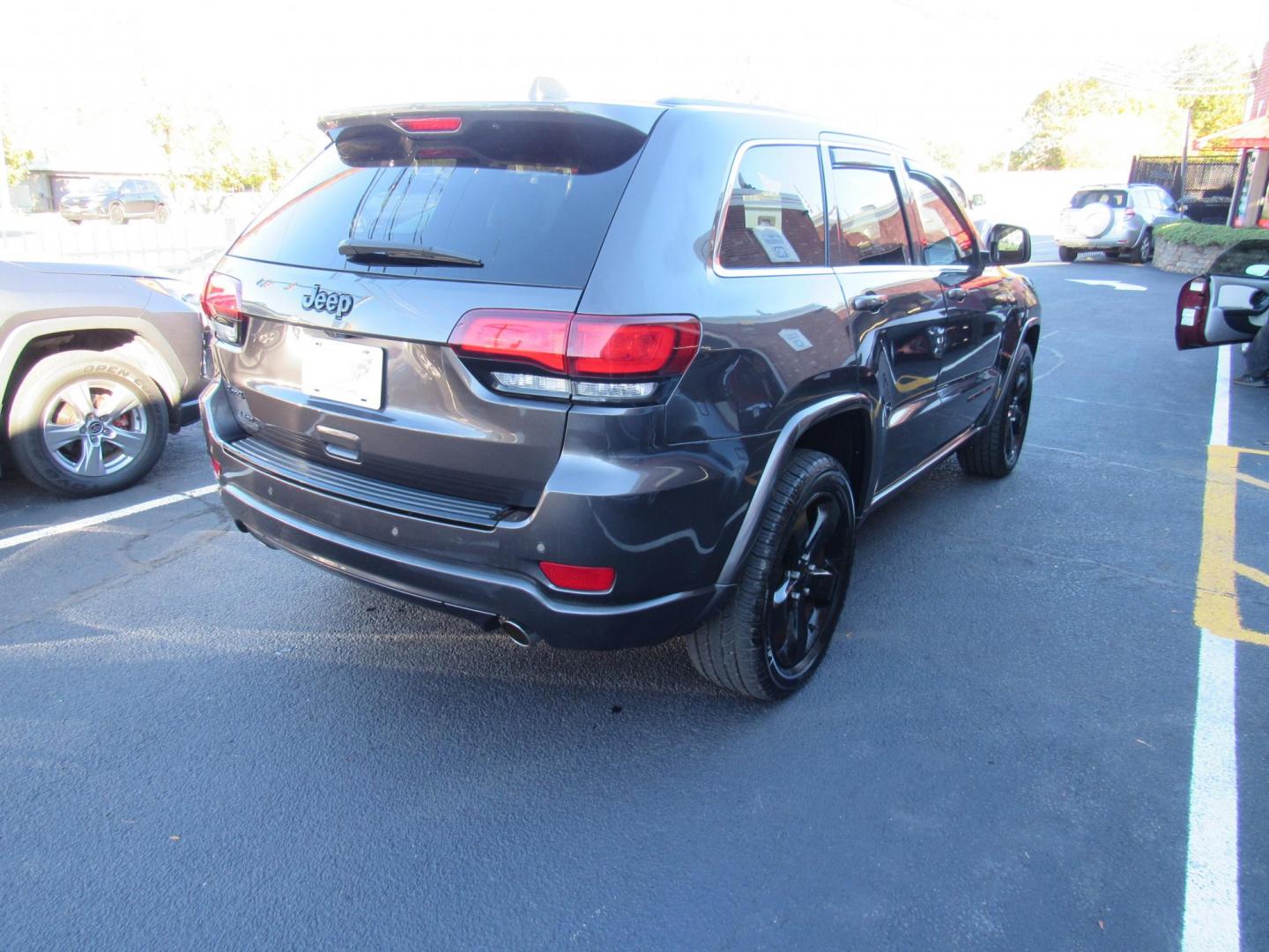 2015 Gray /Black Jeep Grand Cherokee Laredo 4WD (1C4RJFAG8FC) with an 3.6L V6 DOHC 24V engine, 8-Speed Automatic transmission, located at 215 Milton St, Dedham, MA, 02026, (781) 329-5144, 42.241905, -71.157295 - This special edition Altitude is in excellent condition. Runs like brand new. Lots of recent service. 4 new tires. Loaded up with Leather, Alloys, Moonroof, Sport suspension. All ASPI Motor Cars vehicles are fully service before they are delivered. Comes with a 3/3 warranty included in the price. Ca - Photo#6
