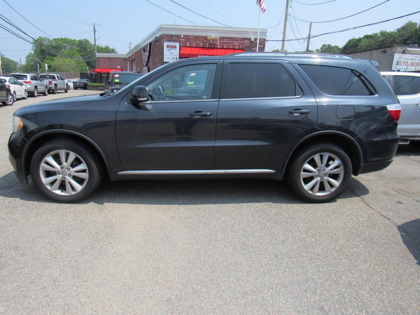 2012 Blue /Gray Dodge Durango Crew AWD (1C4RDJDG4CC) with an 3.6L V6 DOHC 24V engine, 5-Speed Automatic transmission, located at 215 Milton St, Dedham, MA, 02026, (781) 329-5144, 42.241905, -71.157295 - Looking for basic transportation, this is the one. This vehicle has been serviced, but is being sold as-is. Vehicle runs and drives great. Hard to find any vehicles in this price range. Great first vehicle or City vehicle. Call today.. - Photo#3