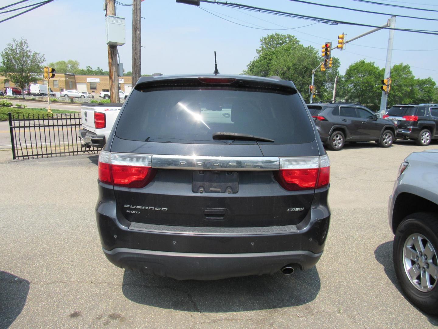 2012 Blue /Gray Dodge Durango Crew AWD (1C4RDJDG4CC) with an 3.6L V6 DOHC 24V engine, 5-Speed Automatic transmission, located at 215 Milton St, Dedham, MA, 02026, (781) 329-5144, 42.241905, -71.157295 - Looking for basic transportation, this is the one. This vehicle has been serviced, but is being sold as-is. Vehicle runs and drives great. Hard to find any vehicles in this price range. Great first vehicle or City vehicle. Call today.. - Photo#5
