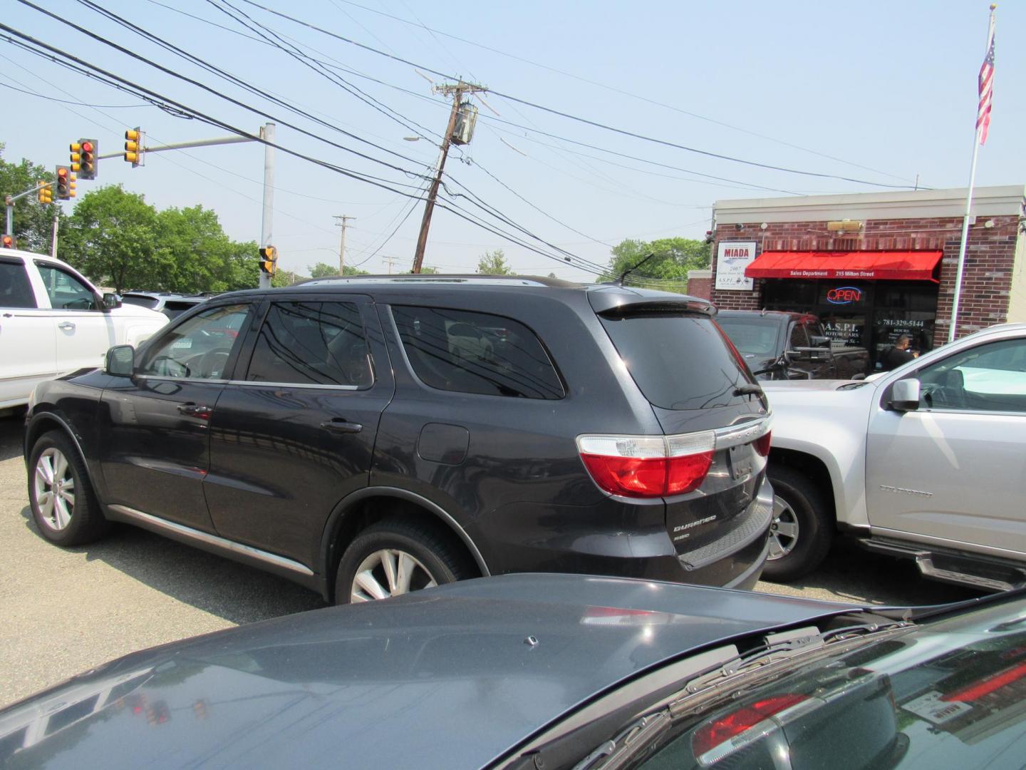 2012 Blue /Gray Dodge Durango Crew AWD (1C4RDJDG4CC) with an 3.6L V6 DOHC 24V engine, 5-Speed Automatic transmission, located at 215 Milton St, Dedham, MA, 02026, (781) 329-5144, 42.241905, -71.157295 - Looking for basic transportation, this is the one. This vehicle has been serviced, but is being sold as-is. Vehicle runs and drives great. Hard to find any vehicles in this price range. Great first vehicle or City vehicle. Call today.. - Photo#4