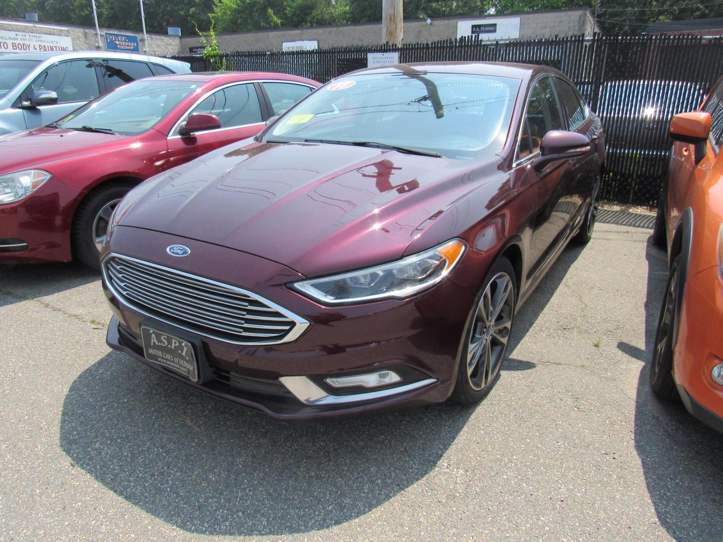 2017 Maroon /Black Ford Fusion Titanium (3FA6P0K99HR) with an 2.0L L4 DOHC 16V engine, 6A transmission, located at 215 Milton St, Dedham, MA, 02026, (781) 329-5144, 42.241905, -71.157295 - This nice loaded sedan is in excellent condition. Runs as good as it looks. Low mileage. All ASPI Motor Cars vehicles are fully service before they are delivered to assure the highest quality used vehicles. Comes with a 3/3 warranty included in the price. Call for details. all vehicles do not i - Photo#2