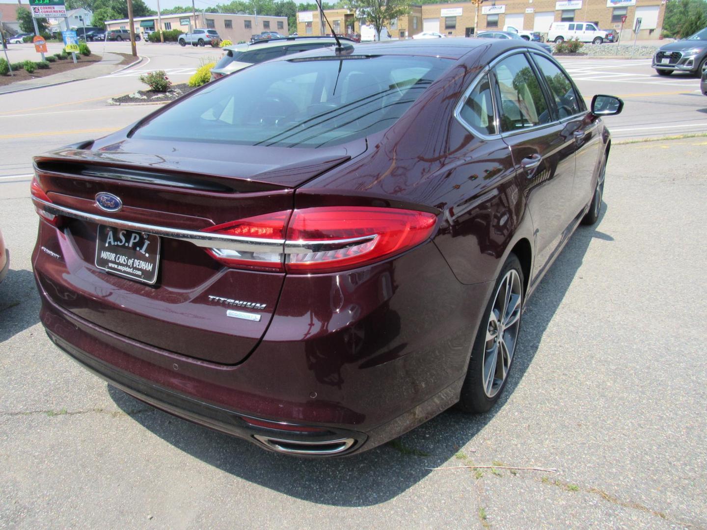 2017 Maroon /Black Ford Fusion Titanium (3FA6P0K99HR) with an 2.0L L4 DOHC 16V engine, 6A transmission, located at 215 Milton St, Dedham, MA, 02026, (781) 329-5144, 42.241905, -71.157295 - This nice loaded sedan is in excellent condition. Runs as good as it looks. Low mileage. All ASPI Motor Cars vehicles are fully service before they are delivered to assure the highest quality used vehicles. Comes with a 3/3 warranty included in the price. Call for details. all vehicles do not i - Photo#6