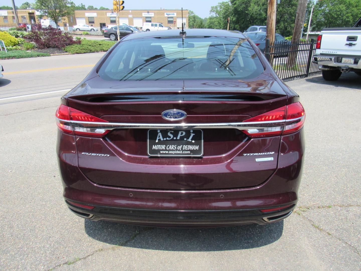 2017 Maroon /Black Ford Fusion Titanium (3FA6P0K99HR) with an 2.0L L4 DOHC 16V engine, 6A transmission, located at 215 Milton St, Dedham, MA, 02026, (781) 329-5144, 42.241905, -71.157295 - This nice loaded sedan is in excellent condition. Runs as good as it looks. Low mileage. All ASPI Motor Cars vehicles are fully service before they are delivered to assure the highest quality used vehicles. Comes with a 3/3 warranty included in the price. Call for details. all vehicles do not i - Photo#5