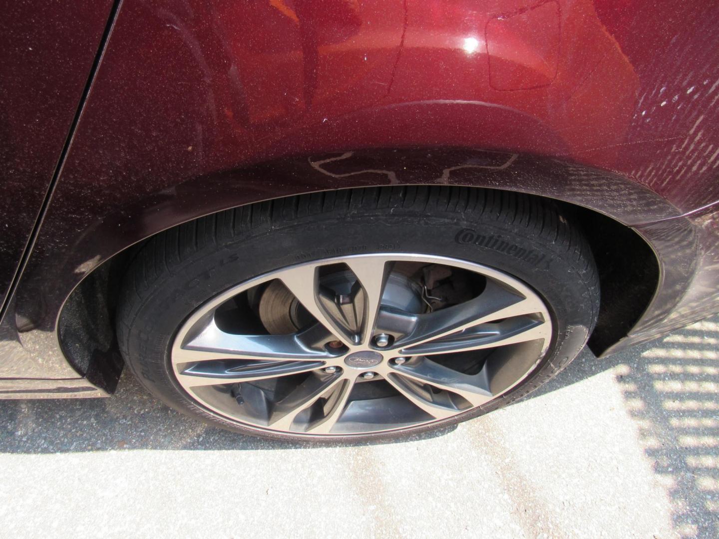 2017 Maroon /Black Ford Fusion Titanium (3FA6P0K99HR) with an 2.0L L4 DOHC 16V engine, 6A transmission, located at 215 Milton St, Dedham, MA, 02026, (781) 329-5144, 42.241905, -71.157295 - This nice loaded sedan is in excellent condition. Runs as good as it looks. Low mileage. All ASPI Motor Cars vehicles are fully service before they are delivered to assure the highest quality used vehicles. Comes with a 3/3 warranty included in the price. Call for details. all vehicles do not i - Photo#9