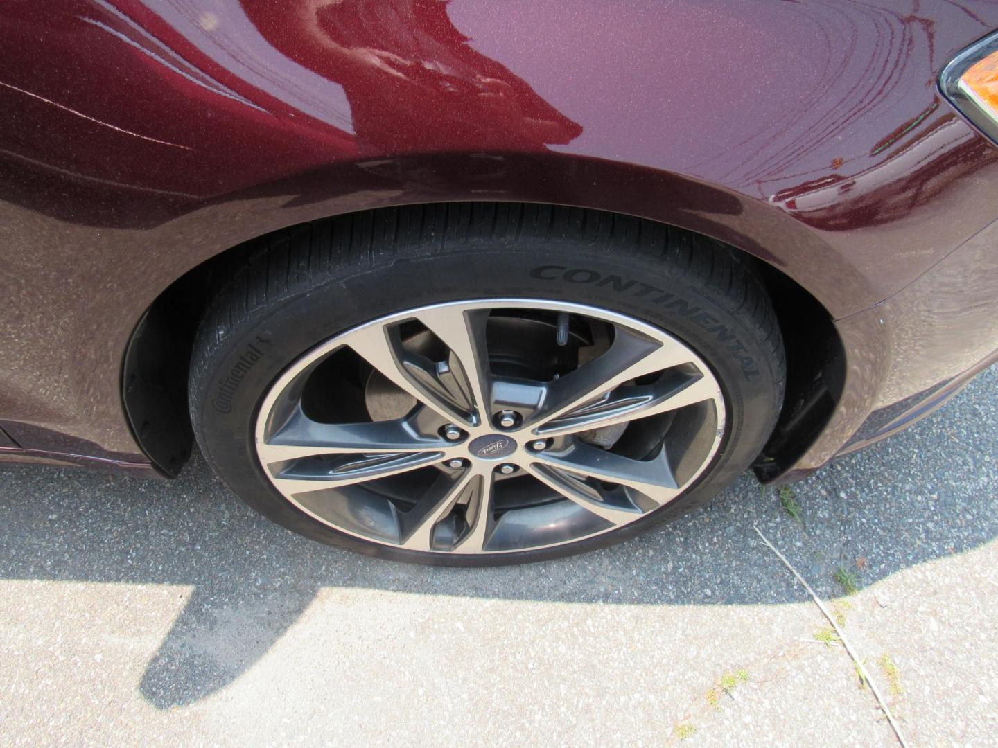 2017 Maroon /Black Ford Fusion Titanium (3FA6P0K99HR) with an 2.0L L4 DOHC 16V engine, 6A transmission, located at 215 Milton St, Dedham, MA, 02026, (781) 329-5144, 42.241905, -71.157295 - This nice loaded sedan is in excellent condition. Runs as good as it looks. Low mileage. All ASPI Motor Cars vehicles are fully service before they are delivered to assure the highest quality used vehicles. Comes with a 3/3 warranty included in the price. Call for details. all vehicles do not i - Photo#10