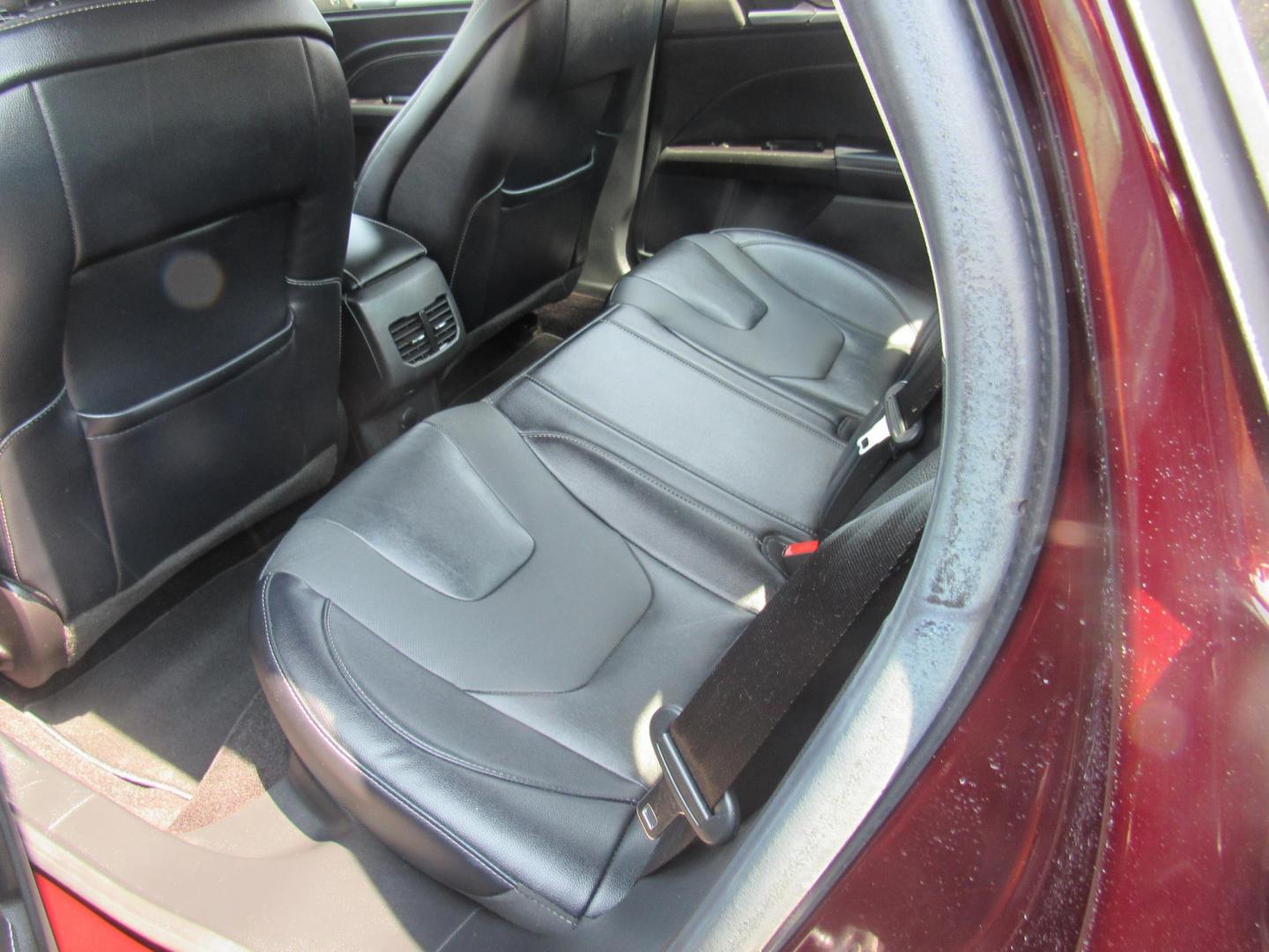 2017 Maroon /Black Ford Fusion Titanium (3FA6P0K99HR) with an 2.0L L4 DOHC 16V engine, 6A transmission, located at 215 Milton St, Dedham, MA, 02026, (781) 329-5144, 42.241905, -71.157295 - This nice loaded sedan is in excellent condition. Runs as good as it looks. Low mileage. All ASPI Motor Cars vehicles are fully service before they are delivered to assure the highest quality used vehicles. Comes with a 3/3 warranty included in the price. Call for details. all vehicles do not i - Photo#13