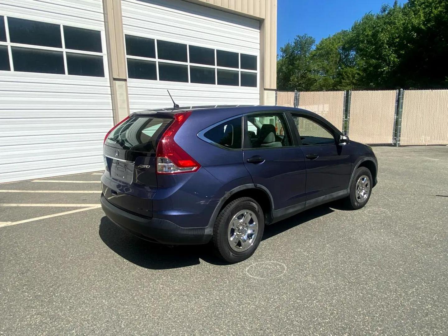 2012 Blue /Grey Honda CR-V LX 4WD 5-Speed AT (5J6RM4H31CL) with an 2.4L L4 DOHC 16V engine, 5-Speed Automatic transmission, located at 215 Milton St, Dedham, MA, 02026, (781) 329-5144, 42.241905, -71.157295 - Always Honda Quality. Always Fully serviced Always Fully Warrantied - Photo#2