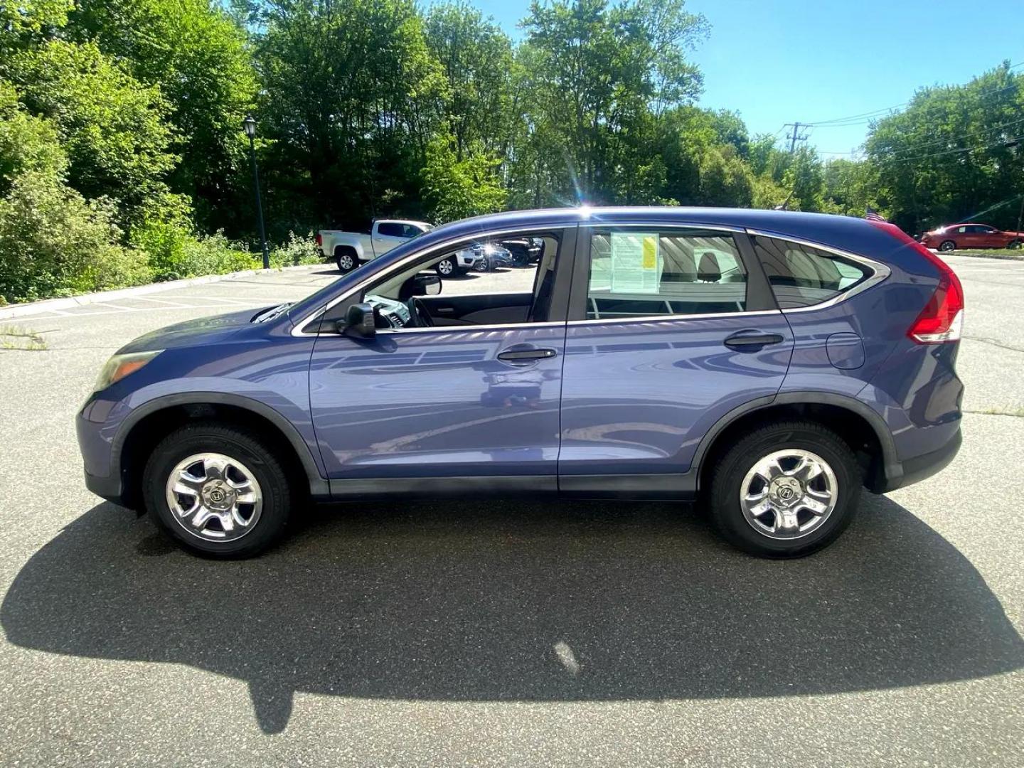 2012 Blue /Grey Honda CR-V LX 4WD 5-Speed AT (5J6RM4H31CL) with an 2.4L L4 DOHC 16V engine, 5-Speed Automatic transmission, located at 215 Milton St, Dedham, MA, 02026, (781) 329-5144, 42.241905, -71.157295 - Always Honda Quality. Always Fully serviced Always Fully Warrantied - Photo#4
