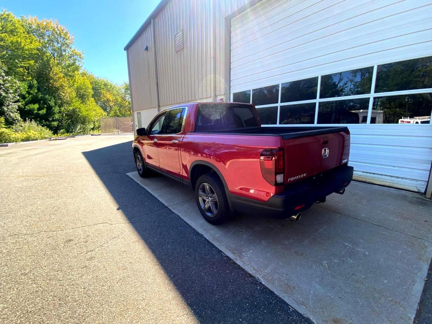 2022 red /Black Honda Ridgeline RTL-E AWD (5FPYK3F71NB) with an 3.5L V6 SOHC 24V engine, 9A transmission, located at 215 Milton St, Dedham, MA, 02026, (781) 329-5144, 42.241905, -71.157295 - Super Nice!!!!!! All ASPI Vehicles are fully serviced before they are delivered to assure the highest quality used vehicles.. Comes with a 3/3 warranty included in the price. Call for details. Prices on all vehicles do not include $299.95 Documentation fee, as well as Massachusetts sales tax, Reg - Photo#3