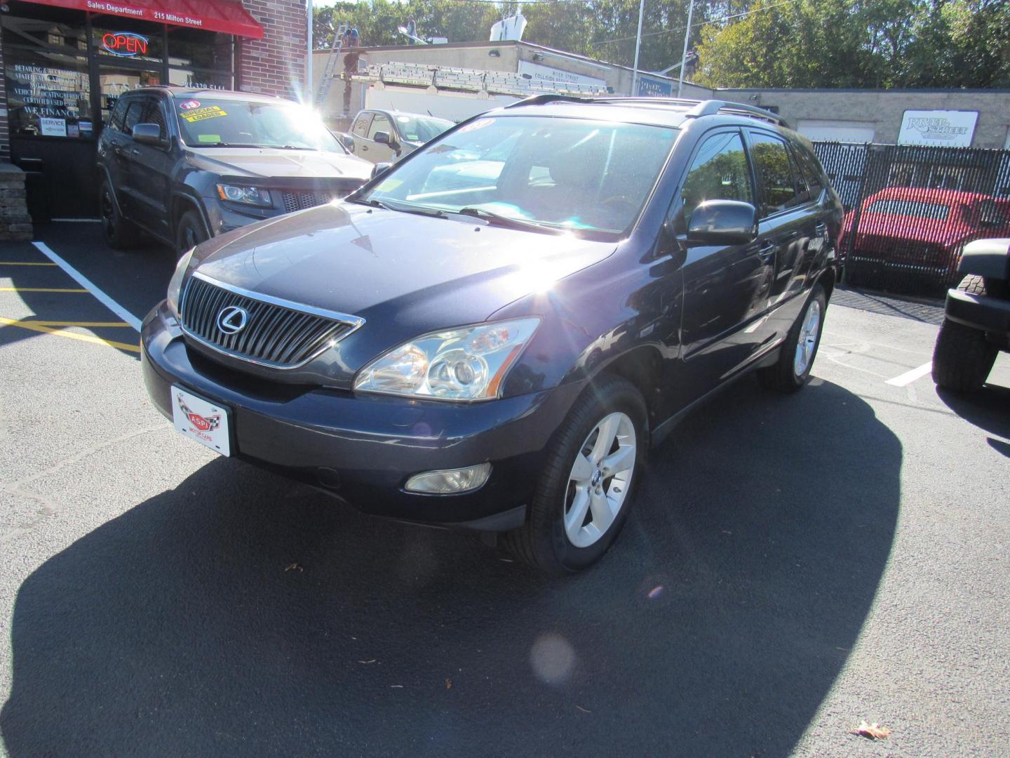 2007 Blue /Tan Lexus RX 350 AWD (2T2HK31U17C) with an 3.5L V6 DOHC 24V engine, 5-Speed Automatic Overdrive transmission, located at 215 Milton St, Dedham, MA, 02026, (781) 329-5144, 42.241905, -71.157295 - This nice Lexus has low mileage for the year. Runs like new . All ASPI Motor Cars vehicles are fully serviced before they are delivered to assure the highest quality used vehicles. Call Today! Prices on all vehicles do not include $299.95 Documentation fee, as well as Massachusetts sales tax, Reg - Photo#2