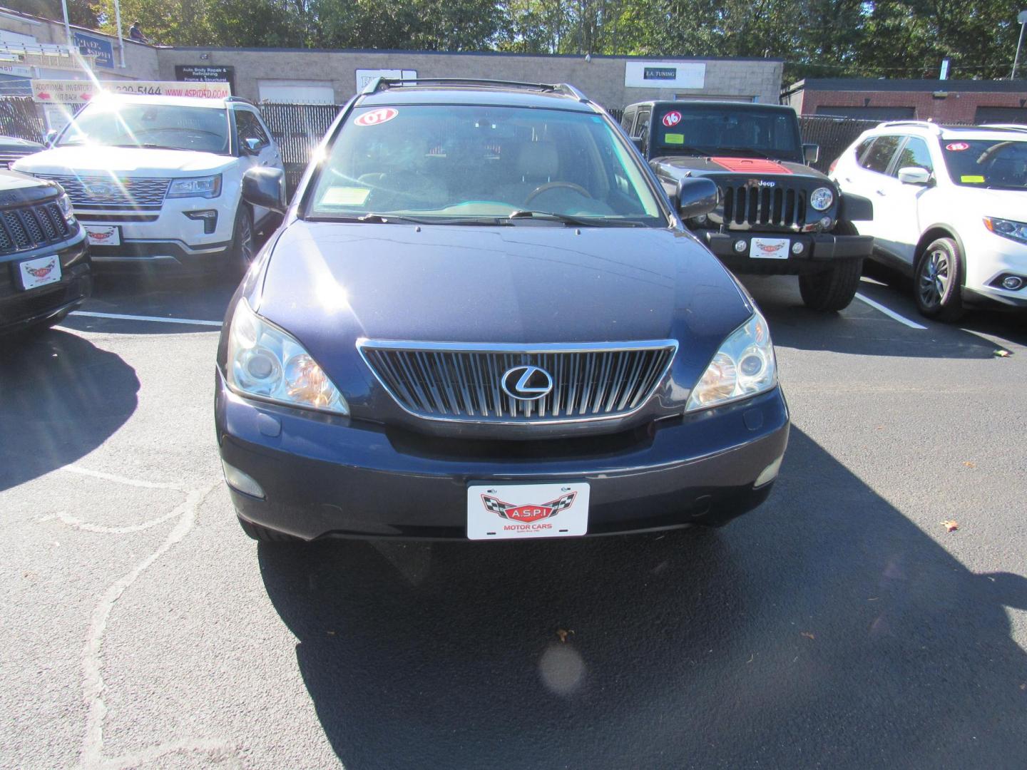 2007 Blue /Tan Lexus RX 350 AWD (2T2HK31U17C) with an 3.5L V6 DOHC 24V engine, 5-Speed Automatic Overdrive transmission, located at 215 Milton St, Dedham, MA, 02026, (781) 329-5144, 42.241905, -71.157295 - This nice Lexus has low mileage for the year. Runs like new . All ASPI Motor Cars vehicles are fully serviced before they are delivered to assure the highest quality used vehicles. Call Today! Prices on all vehicles do not include $299.95 Documentation fee, as well as Massachusetts sales tax, Reg - Photo#5