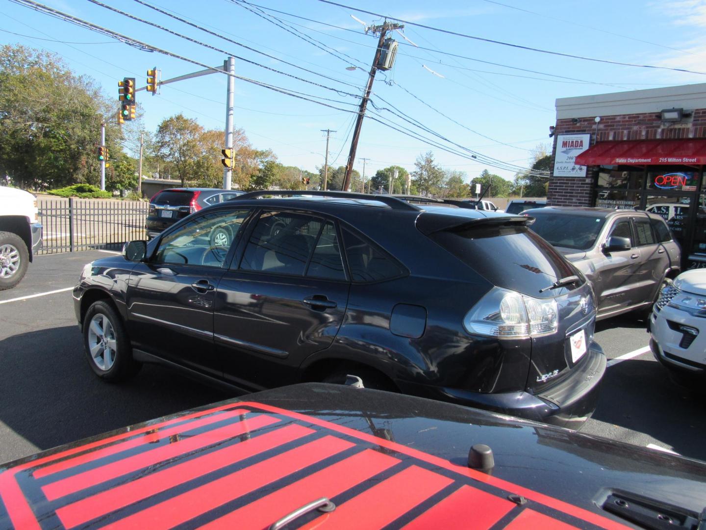 2007 Blue /Tan Lexus RX 350 AWD (2T2HK31U17C) with an 3.5L V6 DOHC 24V engine, 5-Speed Automatic Overdrive transmission, located at 215 Milton St, Dedham, MA, 02026, (781) 329-5144, 42.241905, -71.157295 - This nice Lexus has low mileage for the year. Runs like new . All ASPI Motor Cars vehicles are fully serviced before they are delivered to assure the highest quality used vehicles. Call Today! Prices on all vehicles do not include $299.95 Documentation fee, as well as Massachusetts sales tax, Reg - Photo#7