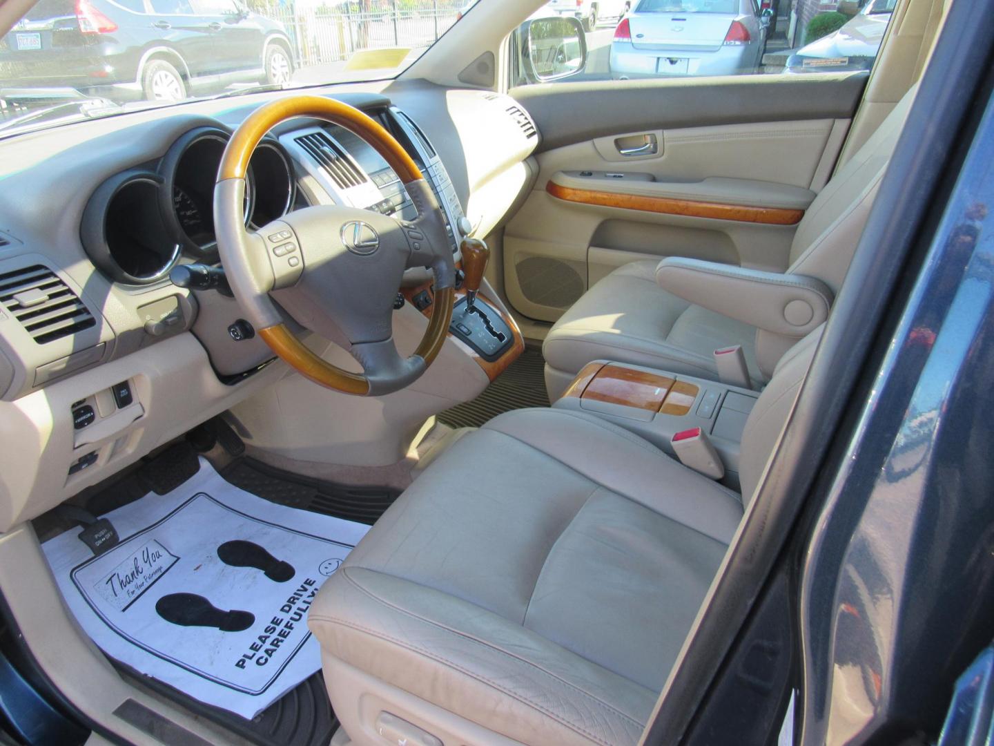 2007 Blue /Tan Lexus RX 350 AWD (2T2HK31U17C) with an 3.5L V6 DOHC 24V engine, 5-Speed Automatic Overdrive transmission, located at 215 Milton St, Dedham, MA, 02026, (781) 329-5144, 42.241905, -71.157295 - This nice Lexus has low mileage for the year. Runs like new . All ASPI Motor Cars vehicles are fully serviced before they are delivered to assure the highest quality used vehicles. Call Today! Prices on all vehicles do not include $299.95 Documentation fee, as well as Massachusetts sales tax, Reg - Photo#15
