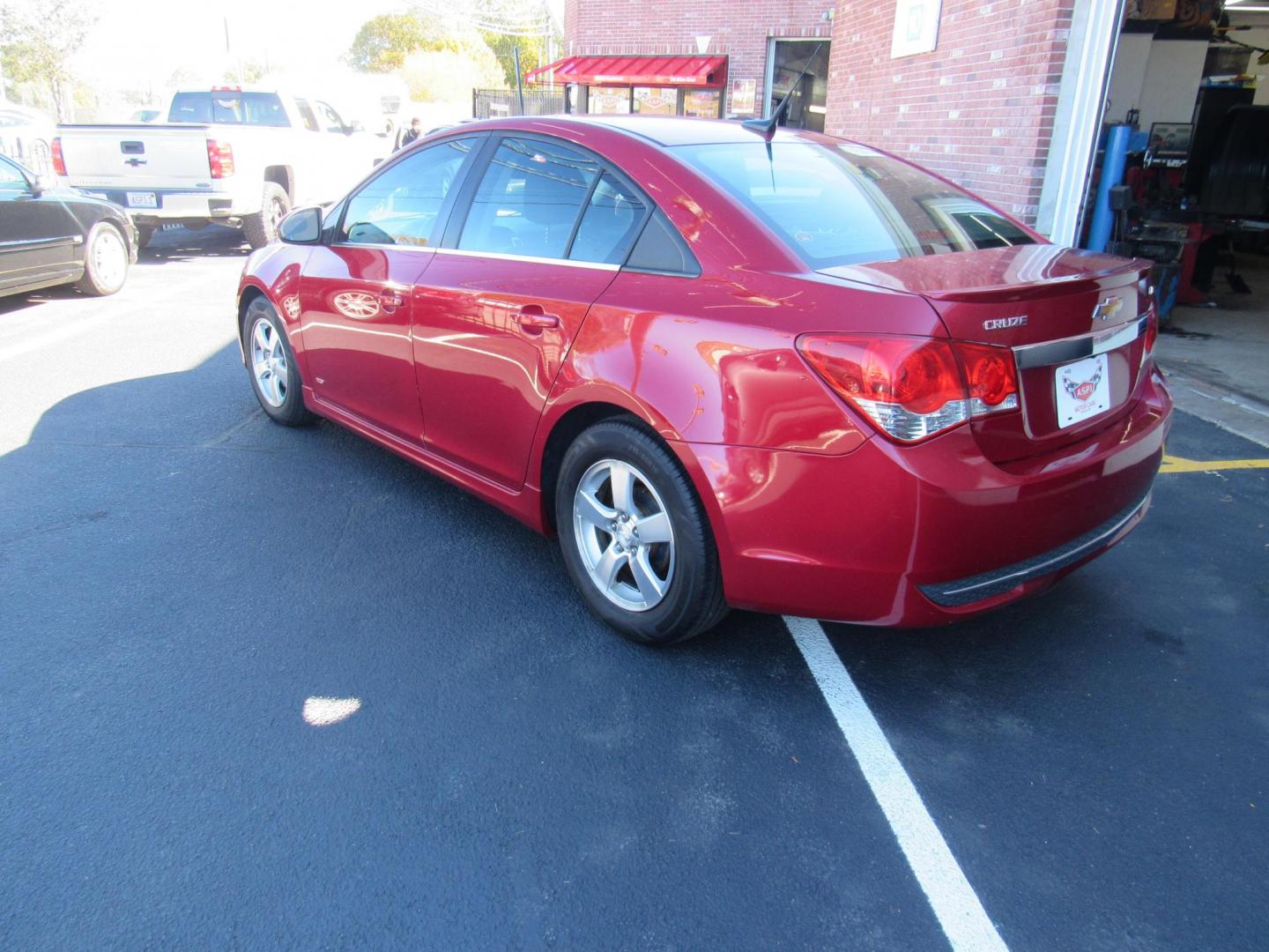 2013 red /Grey Chevrolet Cruze 1LT Auto (1G1PC5SB8D7) with an 1.4L L4 DOHC 16V TURBO engine, 6-Speed Automatic transmission, located at 215 Milton St, Dedham, MA, 02026, (781) 329-5144, 42.241905, -71.157295 - This nice little low mileage sedan is in excellent condition. Runs like new. All ASPI Motor Cras vehicles are fully service before they are delivered to assure the highest quality used vehicles. Come with a 3/3 warranty included in the price. Call for details. Prices on all vehicles do not inc - Photo#4