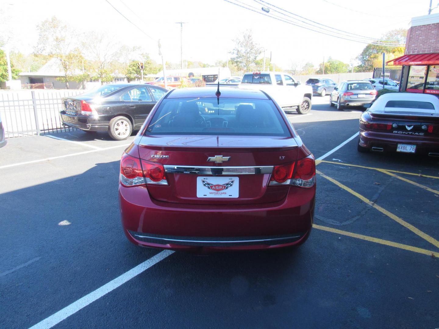 2013 red /Grey Chevrolet Cruze 1LT Auto (1G1PC5SB8D7) with an 1.4L L4 DOHC 16V TURBO engine, 6-Speed Automatic transmission, located at 215 Milton St, Dedham, MA, 02026, (781) 329-5144, 42.241905, -71.157295 - This nice little low mileage sedan is in excellent condition. Runs like new. All ASPI Motor Cras vehicles are fully service before they are delivered to assure the highest quality used vehicles. Come with a 3/3 warranty included in the price. Call for details. Prices on all vehicles do not inc - Photo#5