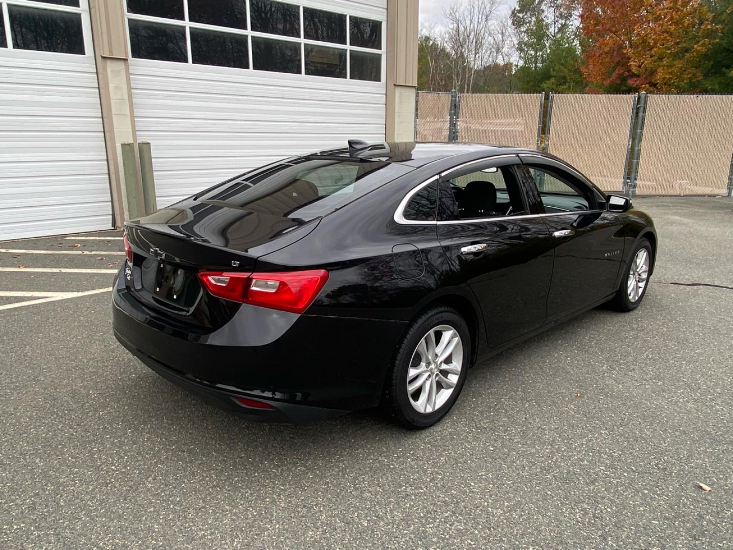 2017 BLACK /charcoal Chevrolet Malibu 1LT (1G1ZE5ST6HF) with an 1.5L L4 DOHC 16V engine, 6A transmission, located at 215 Milton St, Dedham, MA, 02026, (781) 329-5144, 42.241905, -71.157295 - This nice sedan is in excellent condition.Runs like new. All ASPI Motor Cras vehicles are fully service before they are delivered to assure the highest quality used vehicles. Come with a 3/3 warranty included in the price. Call for details. Prices on all vehicles do not include $299.95 Docume - Photo#4