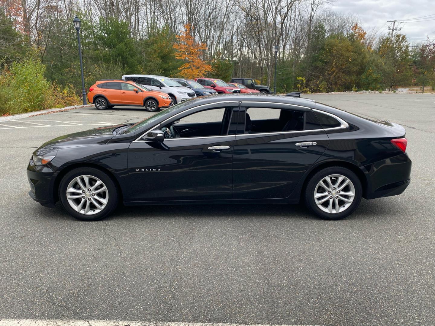 2017 BLACK /charcoal Chevrolet Malibu 1LT (1G1ZE5ST6HF) with an 1.5L L4 DOHC 16V engine, 6A transmission, located at 215 Milton St, Dedham, MA, 02026, (781) 329-5144, 42.241905, -71.157295 - This nice sedan is in excellent condition.Runs like new. All ASPI Motor Cras vehicles are fully service before they are delivered to assure the highest quality used vehicles. Come with a 3/3 warranty included in the price. Call for details. Prices on all vehicles do not include $299.95 Docume - Photo#1