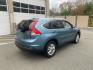 2014 Blue /Tan Honda CR-V EX-L 4WD 5-Speed AT (2HKRM4H7XEH) with an 2.4L L4 DOHC 16V engine, 5-Speed Automatic transmission, located at 215 Milton St, Dedham, MA, 02026, (781) 329-5144, 42.241905, -71.157295 - Take a ride in this sleek Blue 2014 Honda CR-V and get ready to hit the road in style! This car is packed with amazing features to keep you safe and comfortable on your journey. Whether you're cruising on the highway or exploring off-road terrain, the 4WD/AWD system, ABS brakes, traction control, an - Photo#2