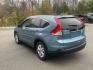 2014 Blue /Tan Honda CR-V EX-L 4WD 5-Speed AT (2HKRM4H7XEH) with an 2.4L L4 DOHC 16V engine, 5-Speed Automatic transmission, located at 215 Milton St, Dedham, MA, 02026, (781) 329-5144, 42.241905, -71.157295 - Take a ride in this sleek Blue 2014 Honda CR-V and get ready to hit the road in style! This car is packed with amazing features to keep you safe and comfortable on your journey. Whether you're cruising on the highway or exploring off-road terrain, the 4WD/AWD system, ABS brakes, traction control, an - Photo#5