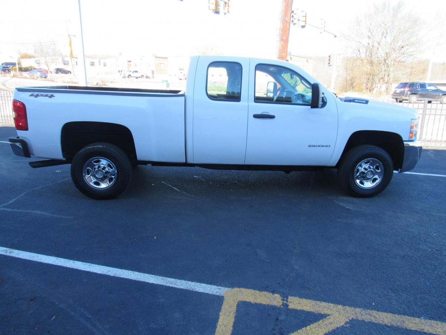 2008 White /Grey Chevrolet Silverado 2500HD LT1 Ext. Cab Long Box 4WD (1GCHK29K18E) with an 6.0L V8 OHV 16V engine, 6-Speed Automatic Overdrive transmission, located at 215 Milton St, Dedham, MA, 02026, (781) 329-5144, 42.241905, -71.157295 - Don't miss this one. 32K mile 2500HD work truck. This truck is in great condition. Fisher Plow ready. Has a plow frame, but no electronics or blade. All ASPI Motor Cars vehicles are serviced before they are delivered to assure the highest quality used vehicles. Call today! - Photo#7
