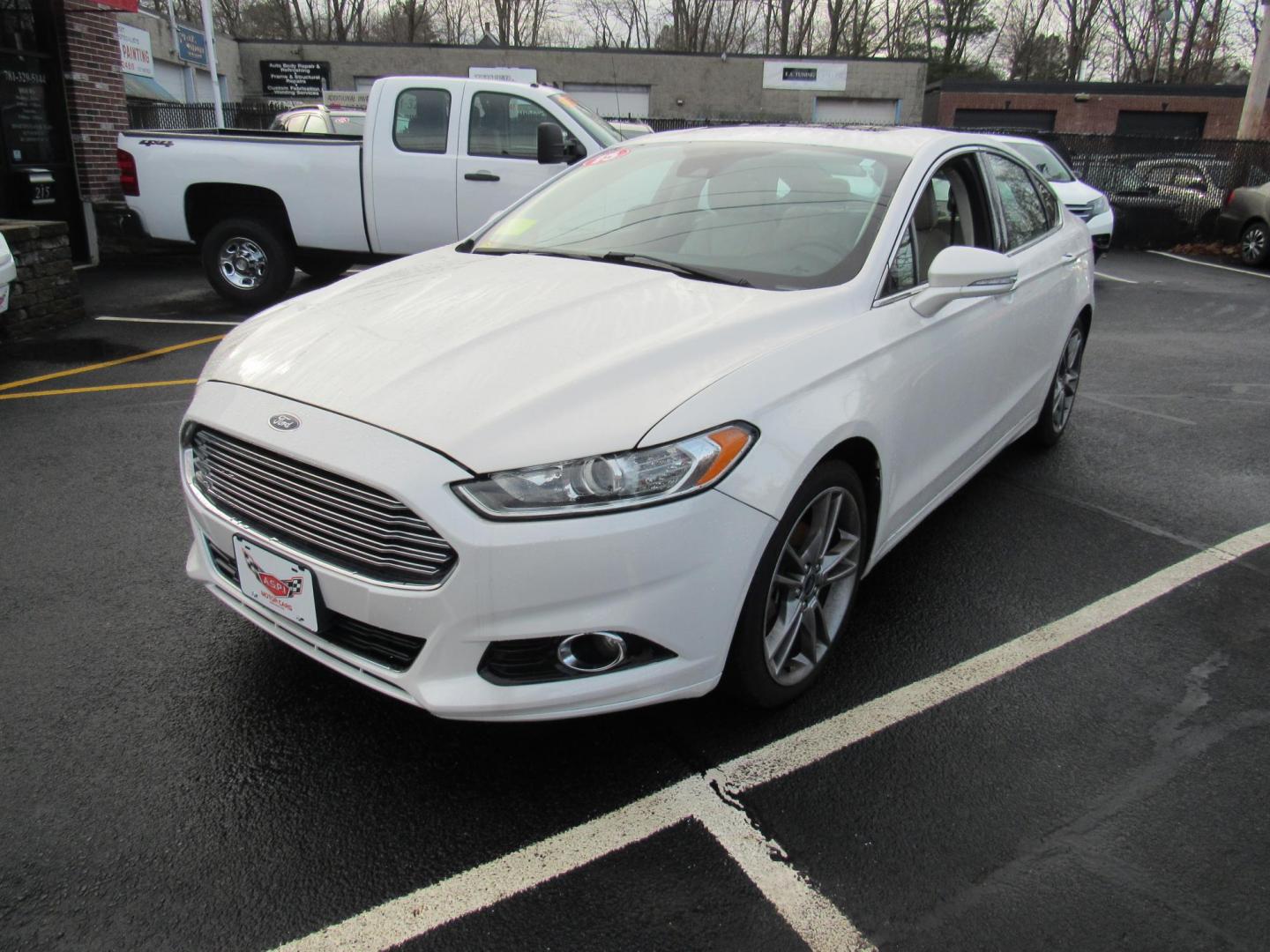 2015 White /Gray Ford Fusion Titanium (3FA6P0K98FR) with an 2.0L L4 DOHC 16V engine, Automatic transmission, located at 215 Milton St, Dedham, MA, 02026, (781) 329-5144, 42.241905, -71.157295 - This nice little sedan runs great. Loaded up Titanium. All ASPI Motor Cars vehicles are fully serviced before they are delivered to assure the highest quality used vehicle. Call for details Prices on all vehicles do not include $299.95 Documentation fee, as well as Massachusetts sales tax, Regist - Photo#2