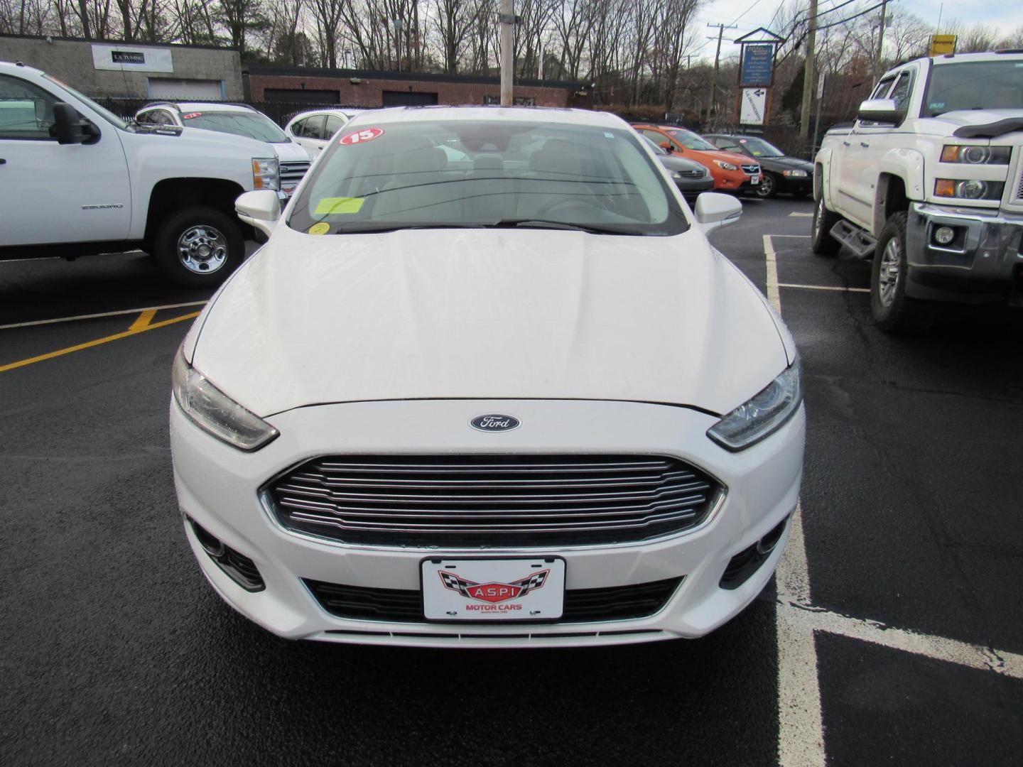 2015 White /Gray Ford Fusion Titanium (3FA6P0K98FR) with an 2.0L L4 DOHC 16V engine, Automatic transmission, located at 215 Milton St, Dedham, MA, 02026, (781) 329-5144, 42.241905, -71.157295 - This nice little sedan runs great. Loaded up Titanium. All ASPI Motor Cars vehicles are fully serviced before they are delivered to assure the highest quality used vehicle. Call for details Prices on all vehicles do not include $299.95 Documentation fee, as well as Massachusetts sales tax, Regist - Photo#1