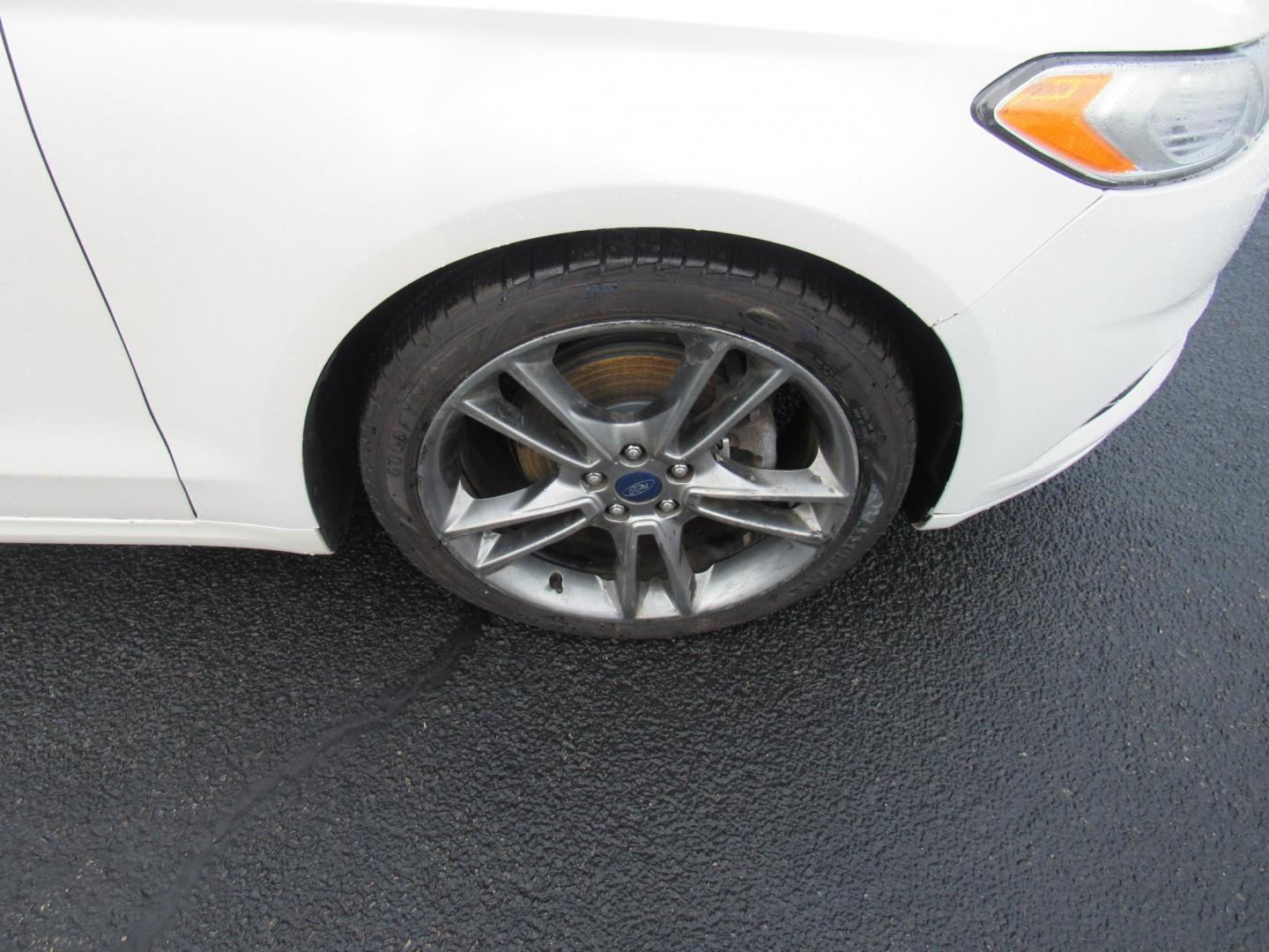 2015 White /Gray Ford Fusion Titanium (3FA6P0K98FR) with an 2.0L L4 DOHC 16V engine, Automatic transmission, located at 215 Milton St, Dedham, MA, 02026, (781) 329-5144, 42.241905, -71.157295 - This nice little sedan runs great. Loaded up Titanium. All ASPI Motor Cars vehicles are fully serviced before they are delivered to assure the highest quality used vehicle. Call for details Prices on all vehicles do not include $299.95 Documentation fee, as well as Massachusetts sales tax, Regist - Photo#9