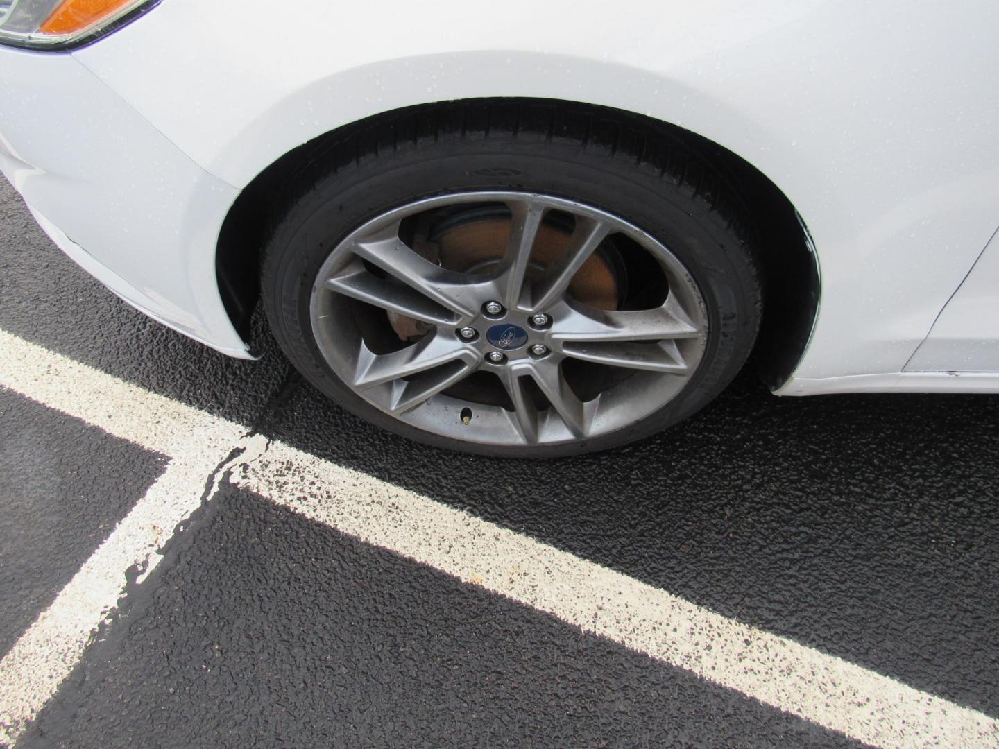 2015 White /Gray Ford Fusion Titanium (3FA6P0K98FR) with an 2.0L L4 DOHC 16V engine, Automatic transmission, located at 215 Milton St, Dedham, MA, 02026, (781) 329-5144, 42.241905, -71.157295 - This nice little sedan runs great. Loaded up Titanium. All ASPI Motor Cars vehicles are fully serviced before they are delivered to assure the highest quality used vehicle. Call for details Prices on all vehicles do not include $299.95 Documentation fee, as well as Massachusetts sales tax, Regist - Photo#10